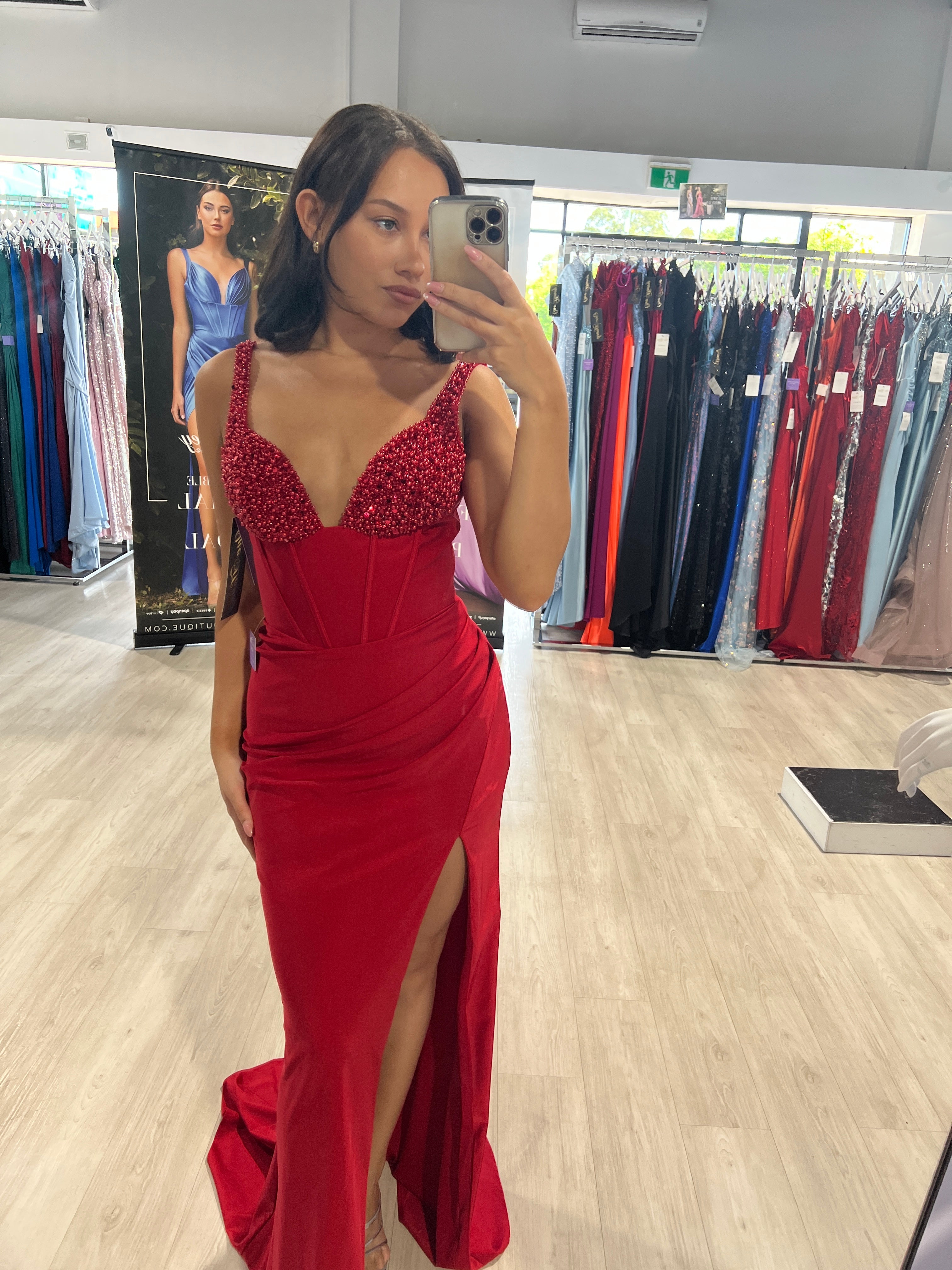 ELVIE Deep V red beaded bustier prom dress with boned waist, side slit; perfect for any formal occasion. Brisbane to Gold Coast, Australia.