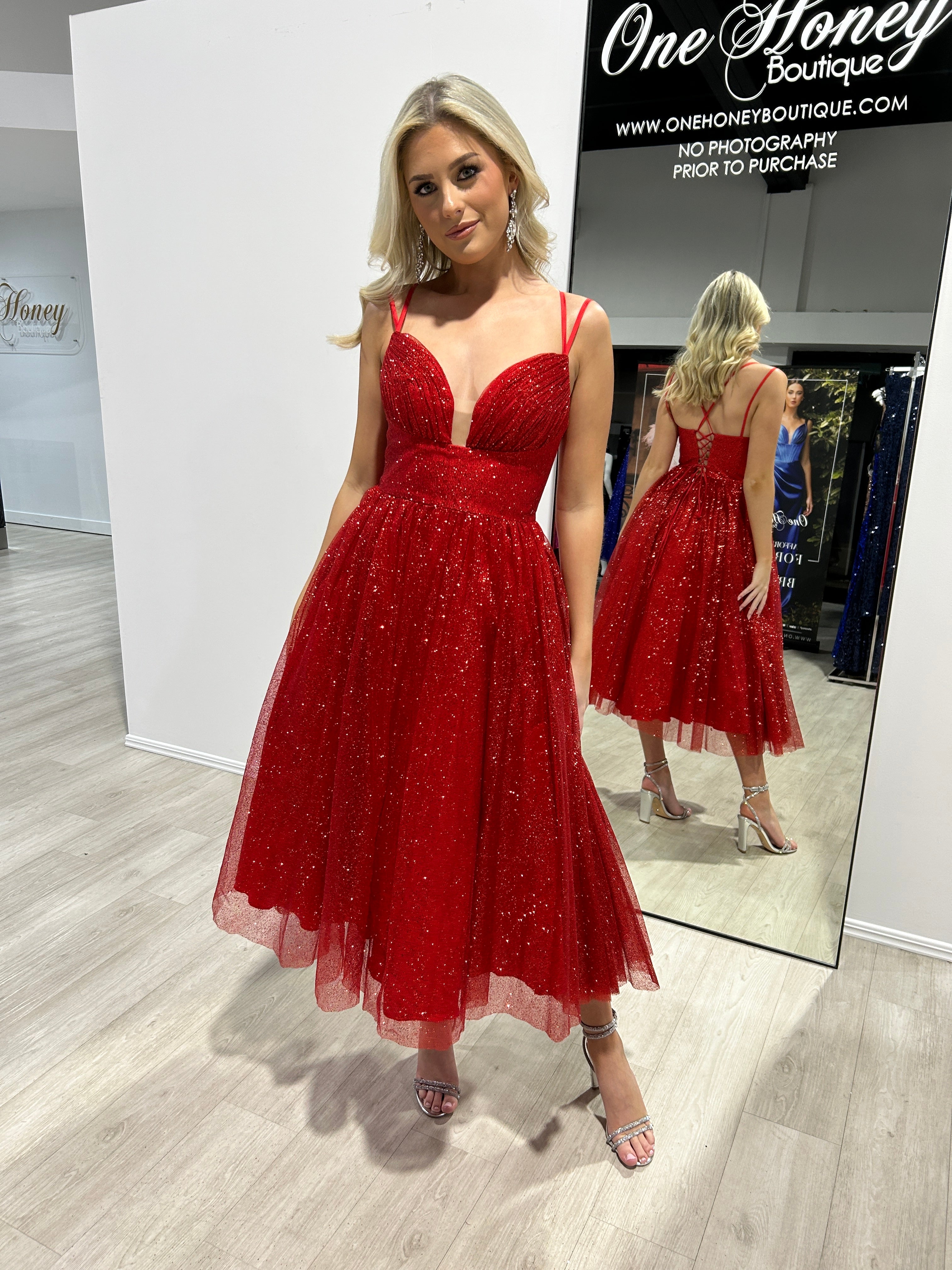 CAM Glitter tea length ball gown with a red glitter corset and layered tulle skirt, perfect for an evening gown in Brisbane to Gold Coast.