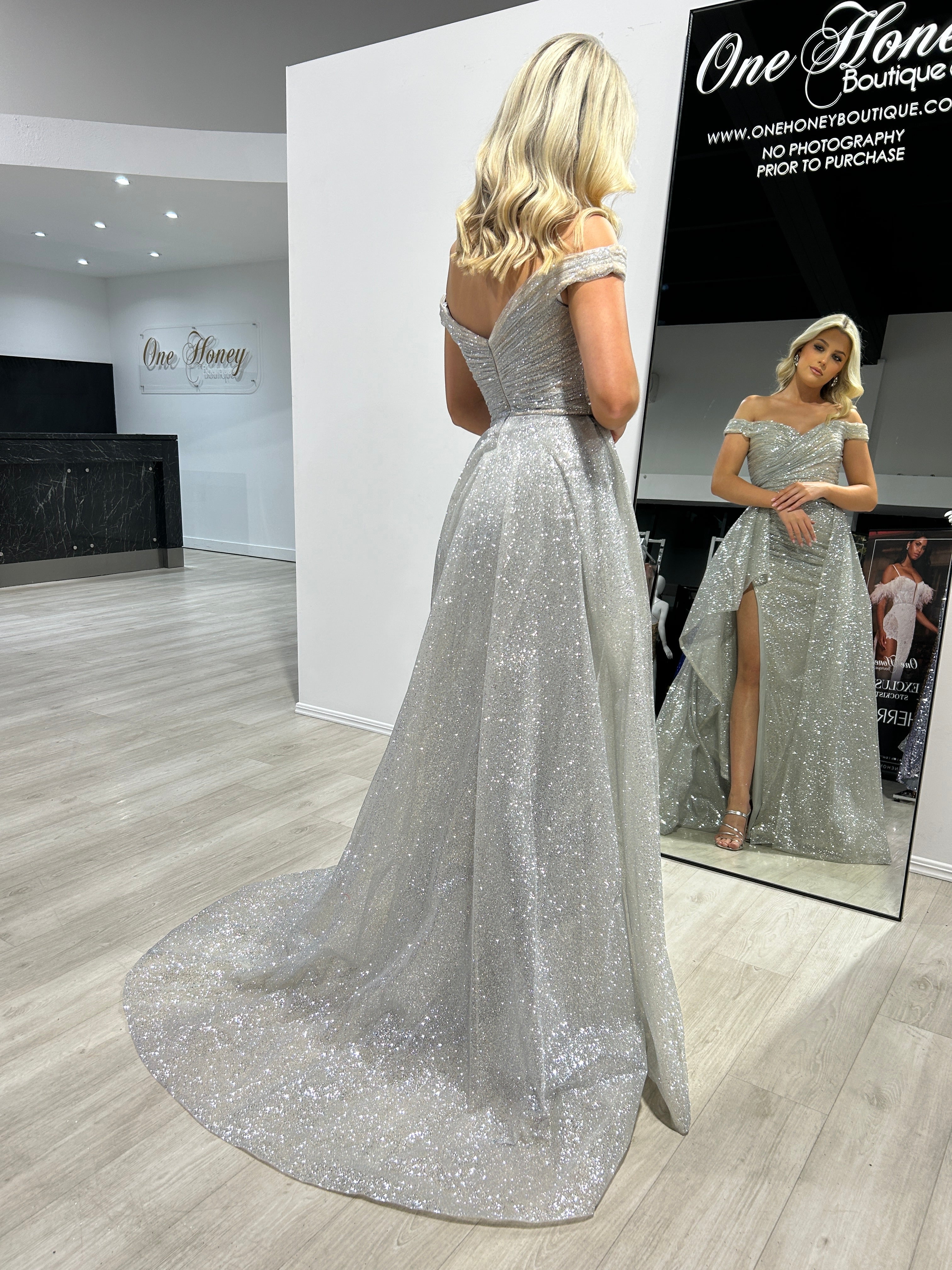 BEBE Glitter Off The Shoulder Overskirt Formal Dress with shimmering fabric and flowing silhouette, evening gown, Brisbane to Gold Coast.