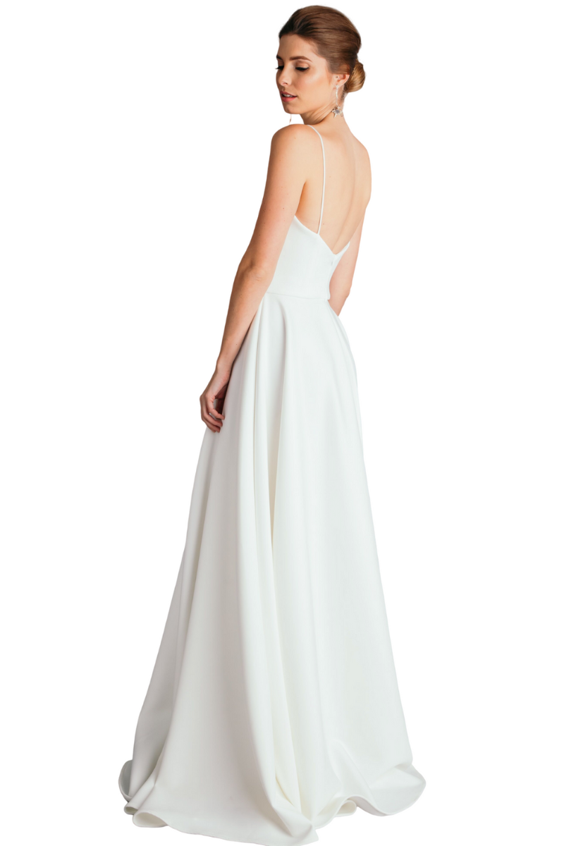 EVITA Bridesmaid Dress with deep V neckline, spaghetti straps, A-line skirt. Elegant floor-length gown perfect for formal events. Brisbane to Gold Coast, Australia.