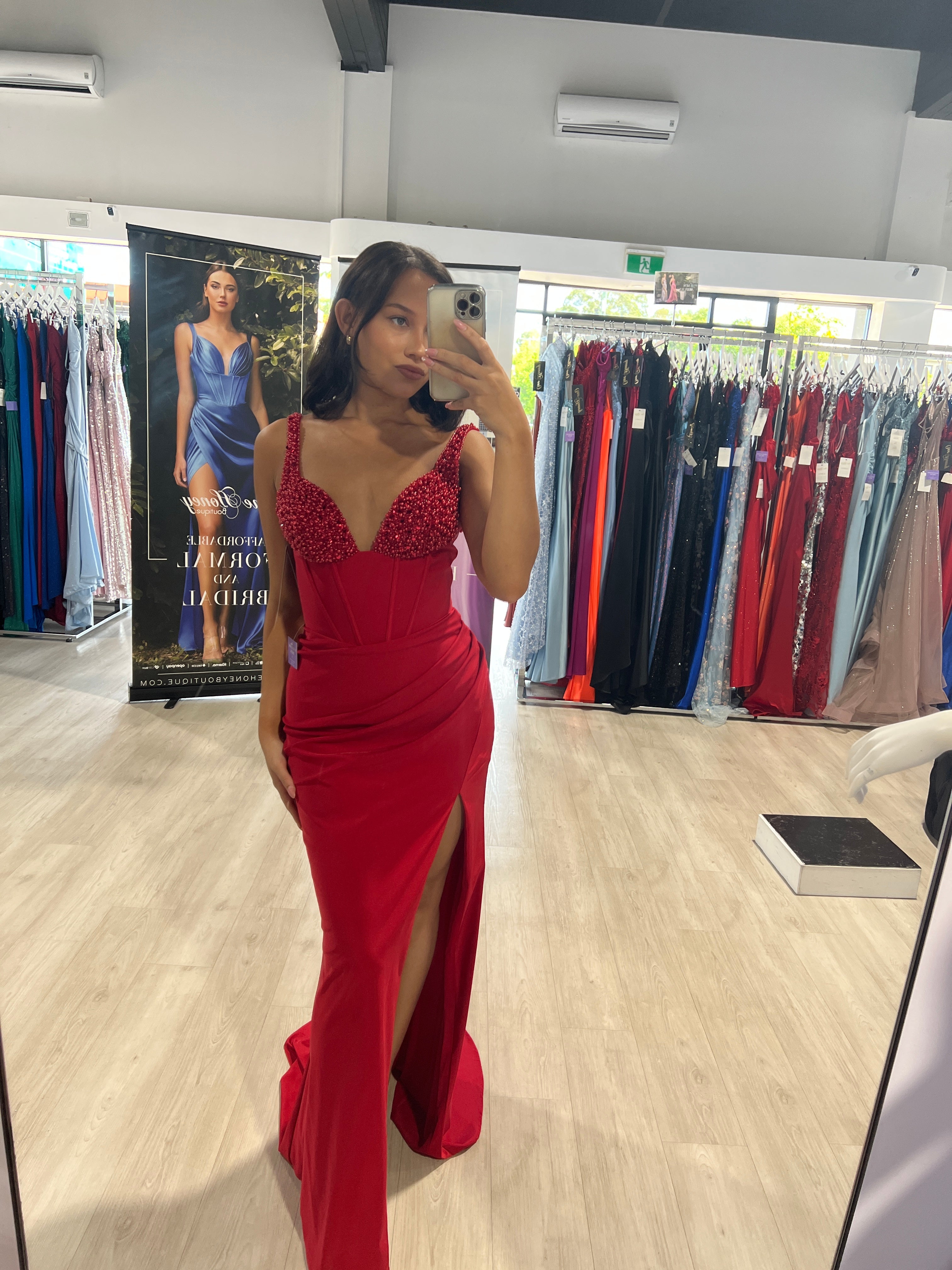 ELVIE Red Beaded Bustier Prom Dress, boned waist, thigh slit, showcases elegance and style, Brisbane to Gold Coast.