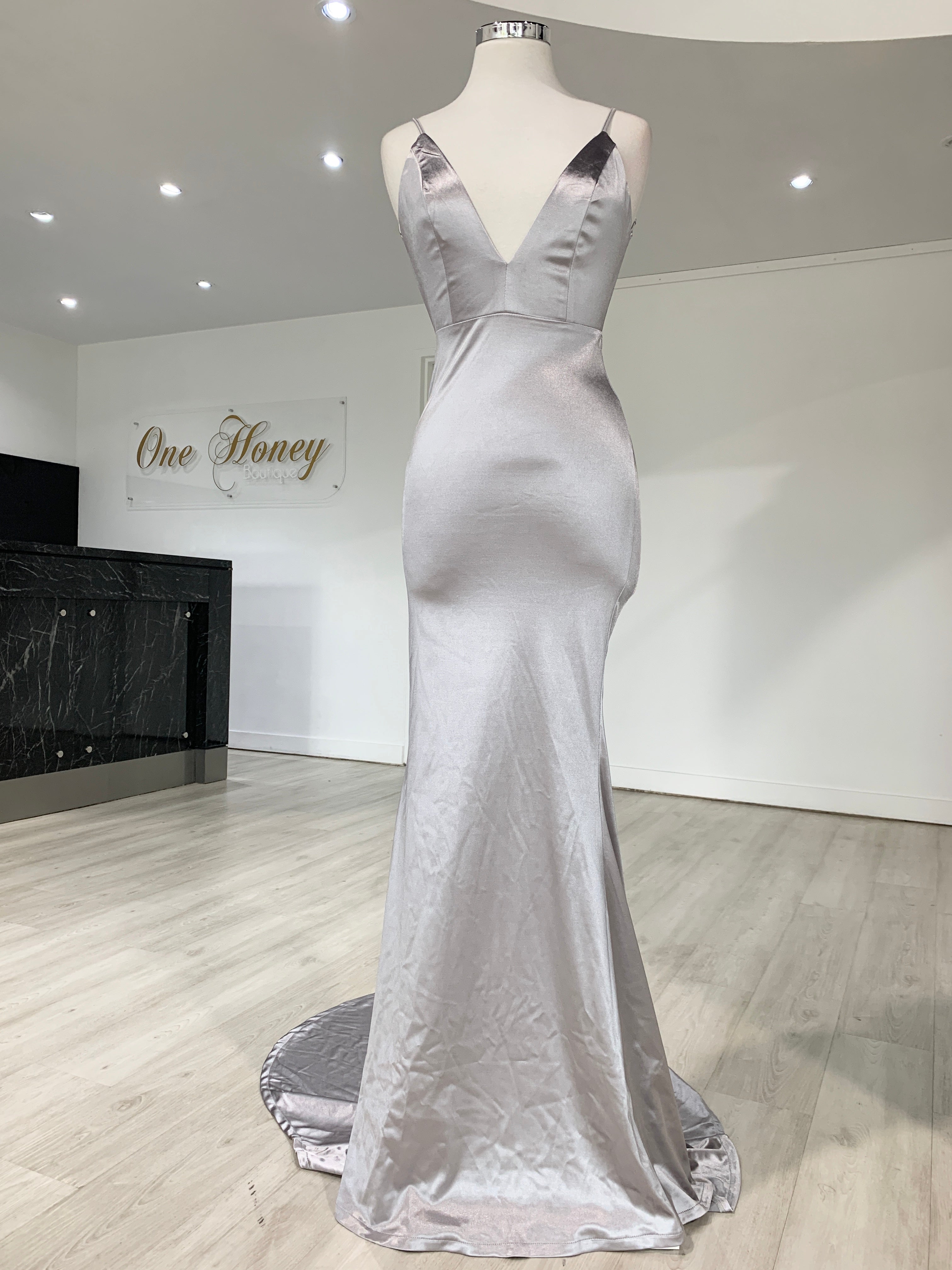 Honey Couture MILEE Low Back Mermaid Evening Gown in silver, featuring silky stretch fabric, seductive low back, and adjustable straps.