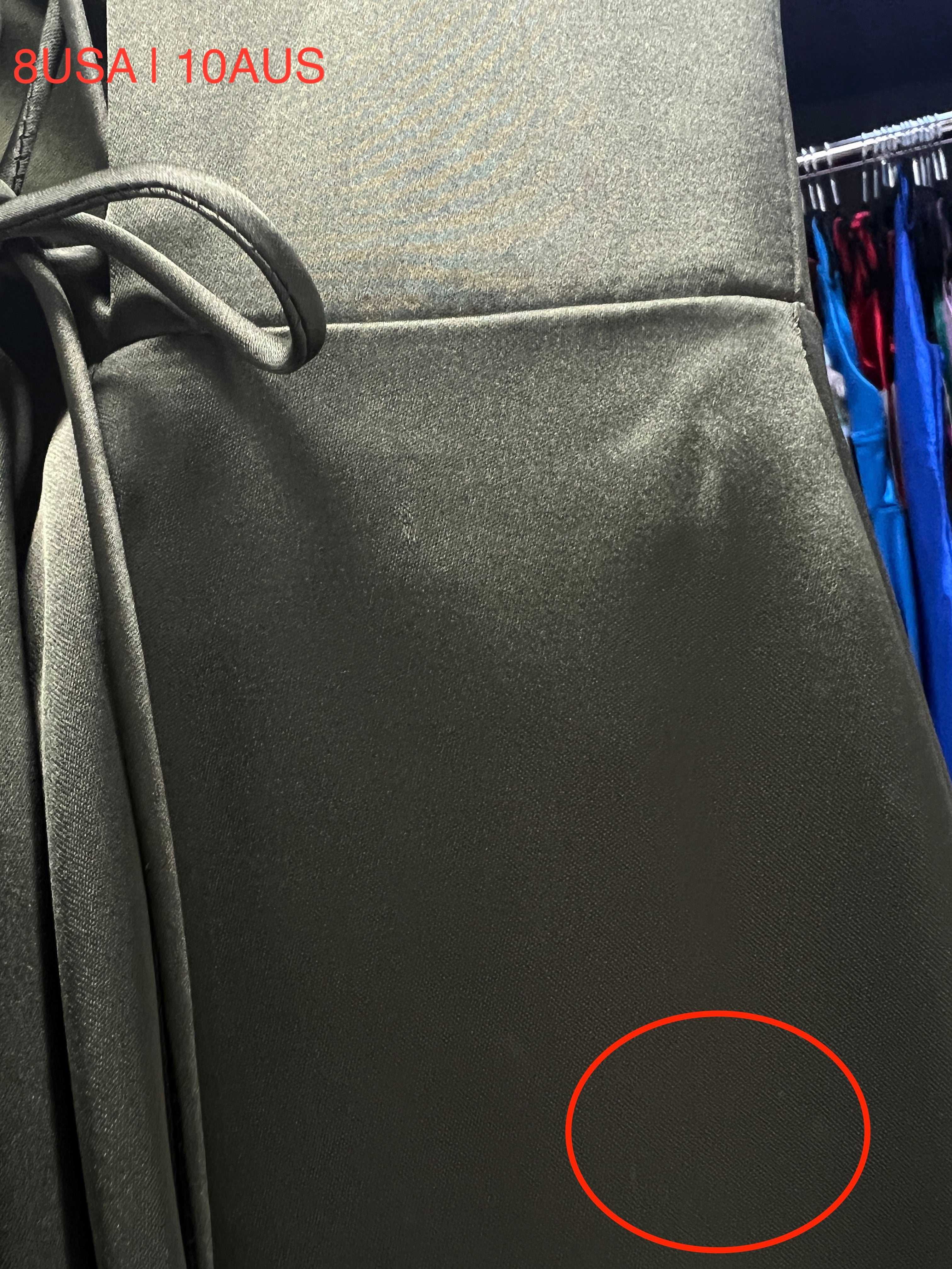 Close-up of ZENDAYA Olive Green Satin Dress by Honey Couture, featuring a silky fabric and lace-up back detail. Australian Designer Fashion.