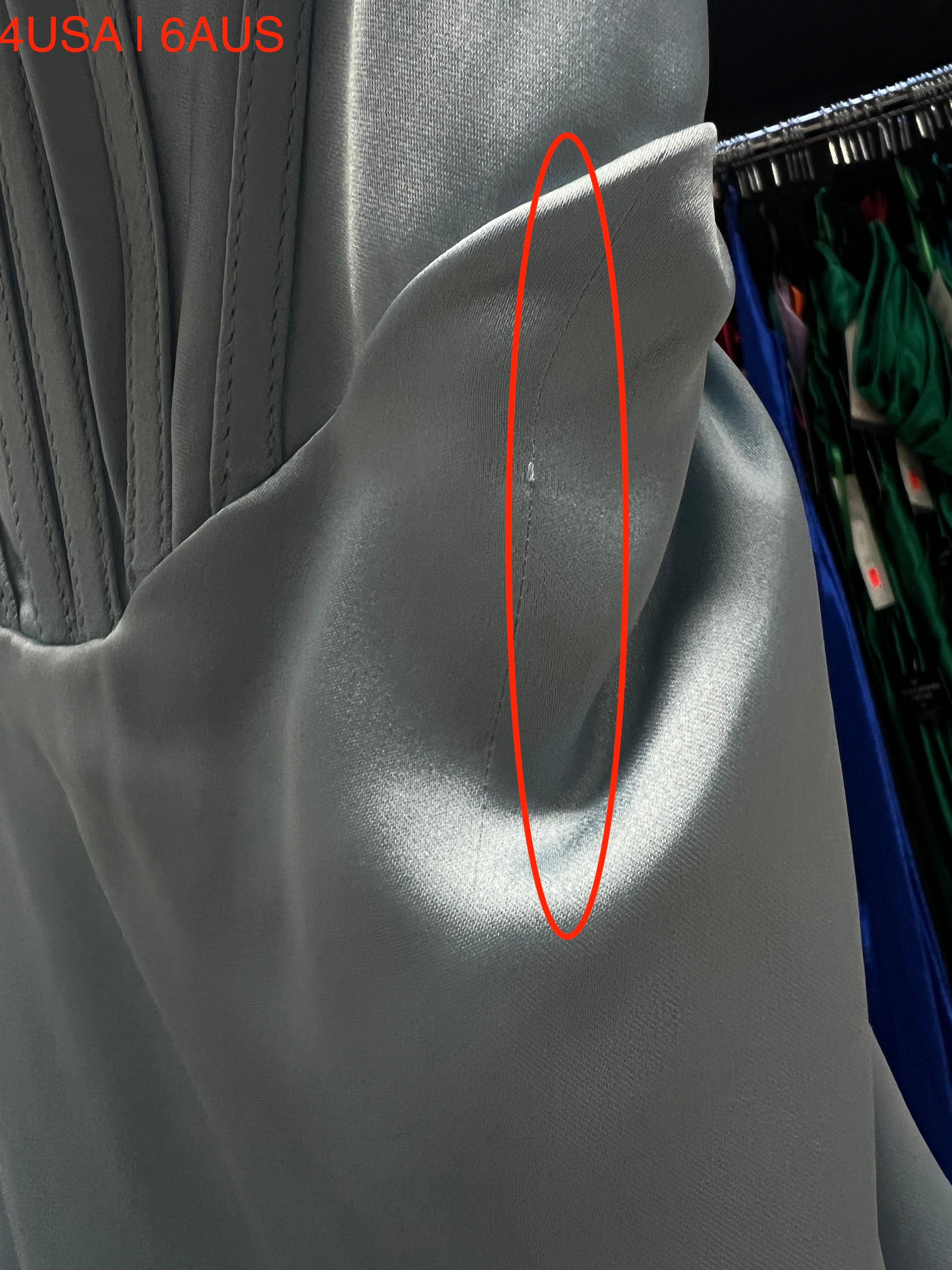 Close-up of Honey Couture ZENDAYA Light Blue Satin Dress detailing, featuring silky fabric and hidden corset, ideal for prom and evening wear.