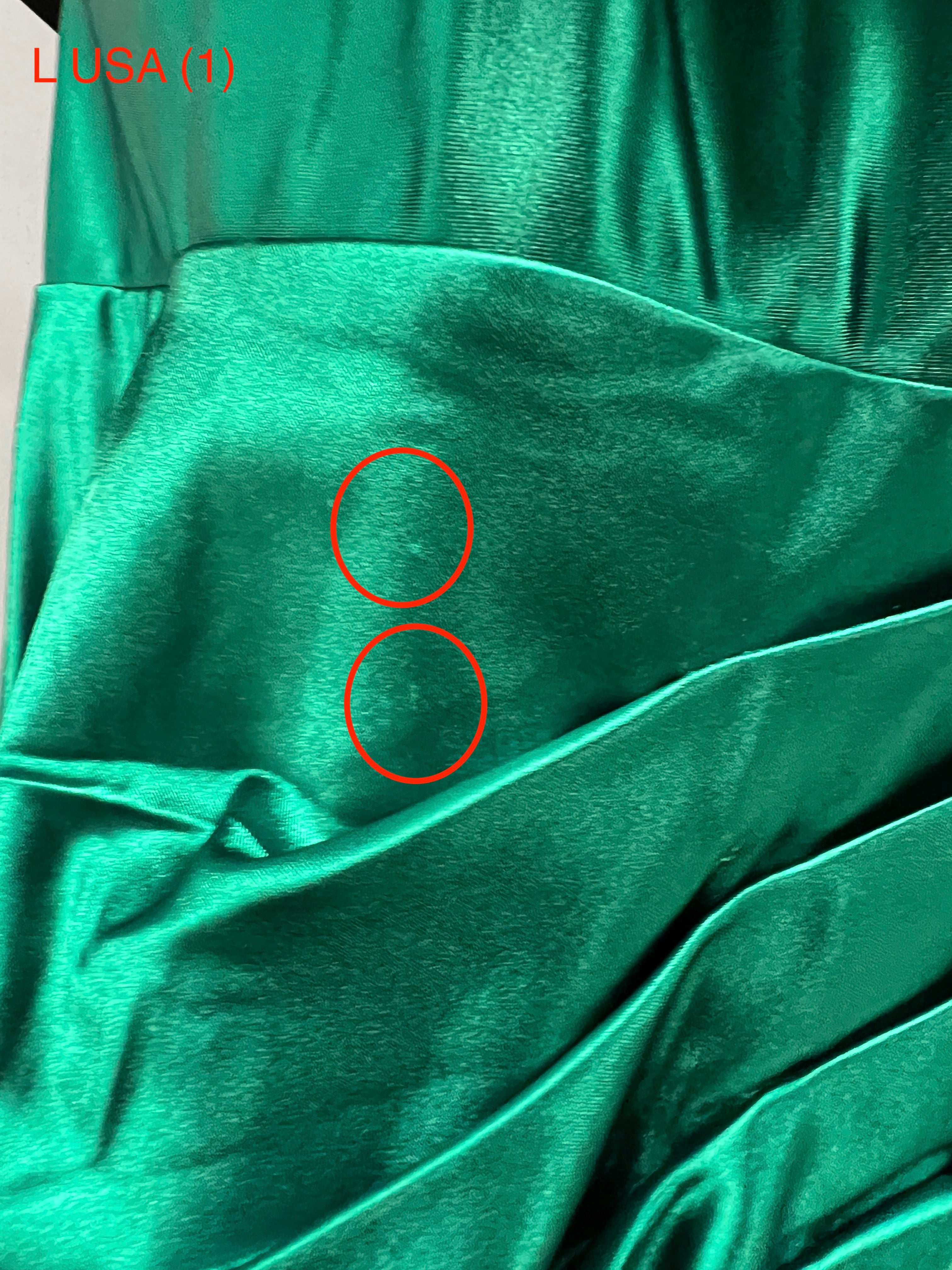 Close-up of Honey Couture SHARYN emerald green silky corset bustier evening gown fabric detail, ruched design, Australian designer