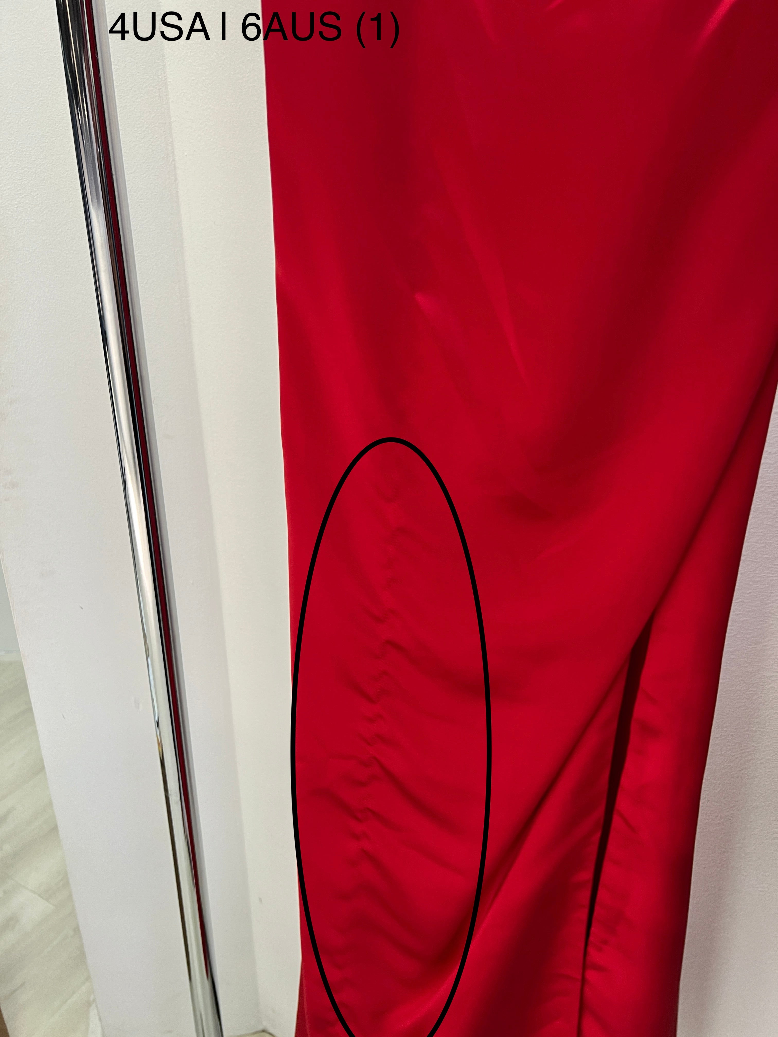 Close-up of red satin fabric and stitching on the ZENDAYA formal dress by Honey Couture, showcasing luxurious design by Australian Designer.