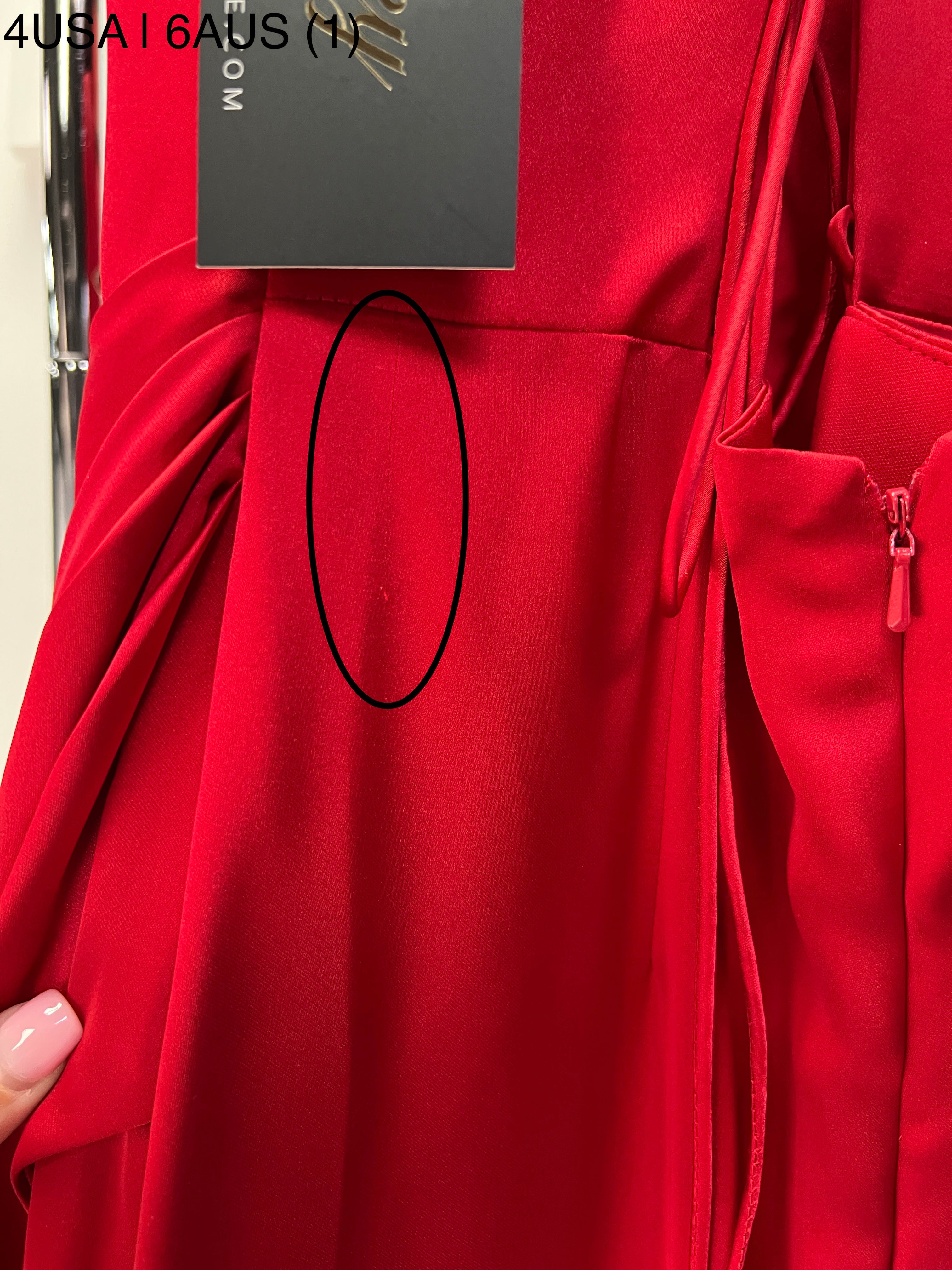 Close-up of Honey Couture ZENDAYA red satin formal dress with silky fabric and hidden corset, Australian designer, perfect for proms and evenings.