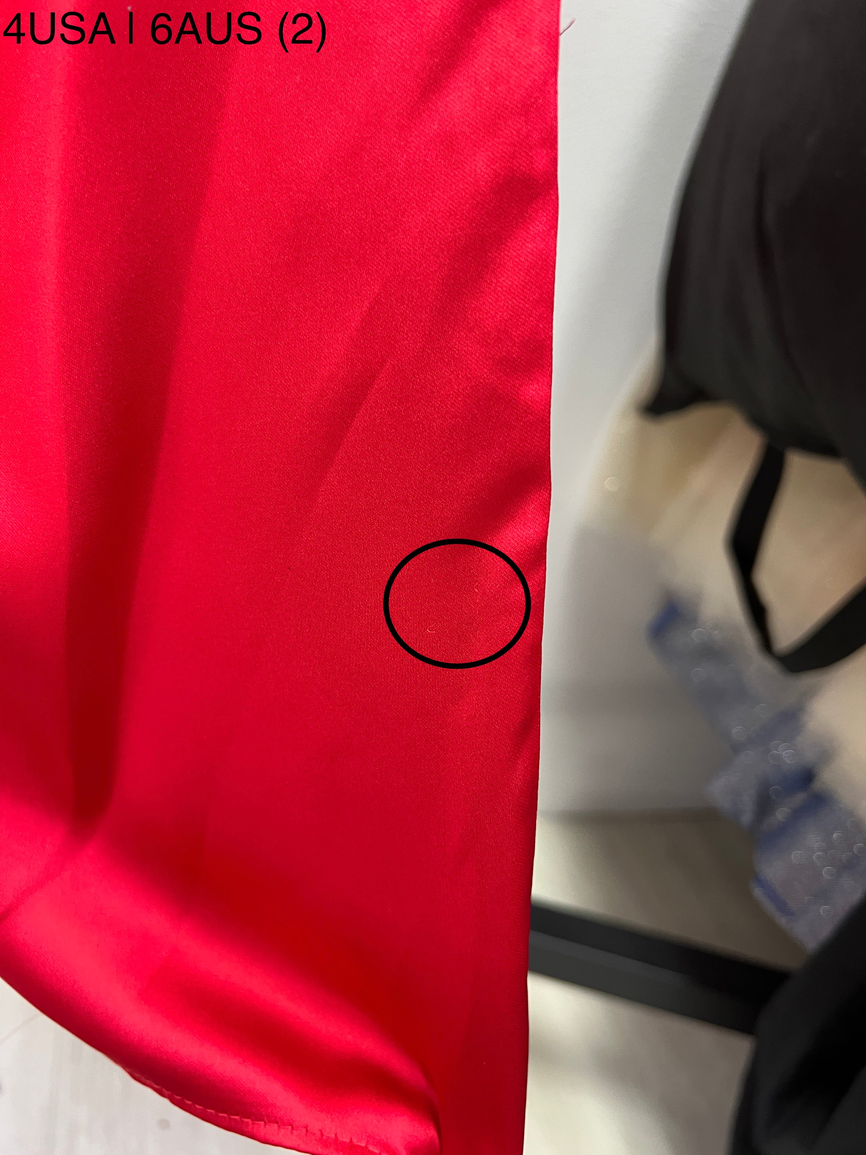Close-up of the Honey Couture ZENDAYA Red Satin Dress highlighting fabric detail, ideal for prom or evening events.
