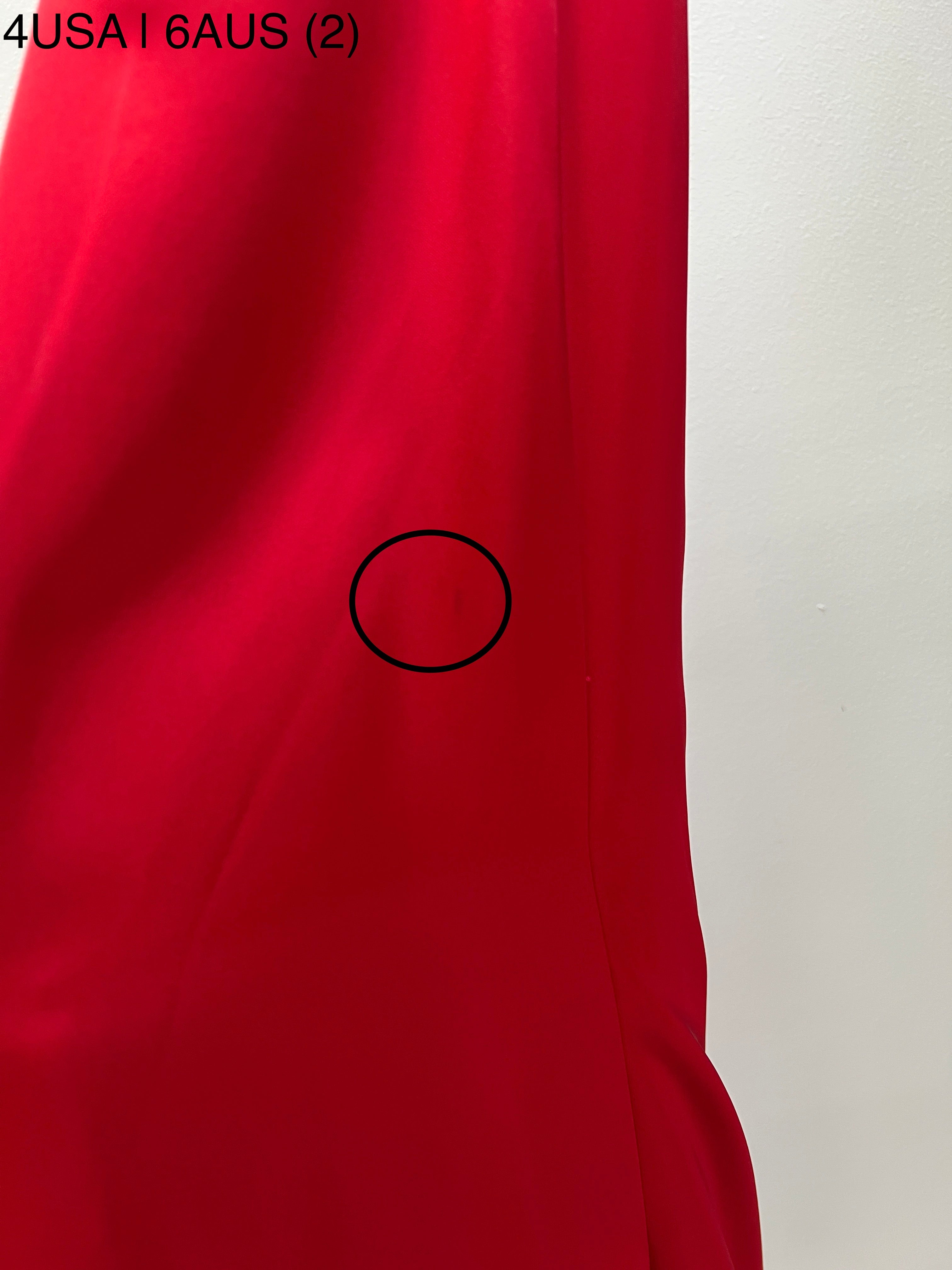 Close-up of Honey Couture ZENDAYA Red Satin Dress fabric, highlighting material texture. Australian Designer, Prom Dresses, Evening Gowns.