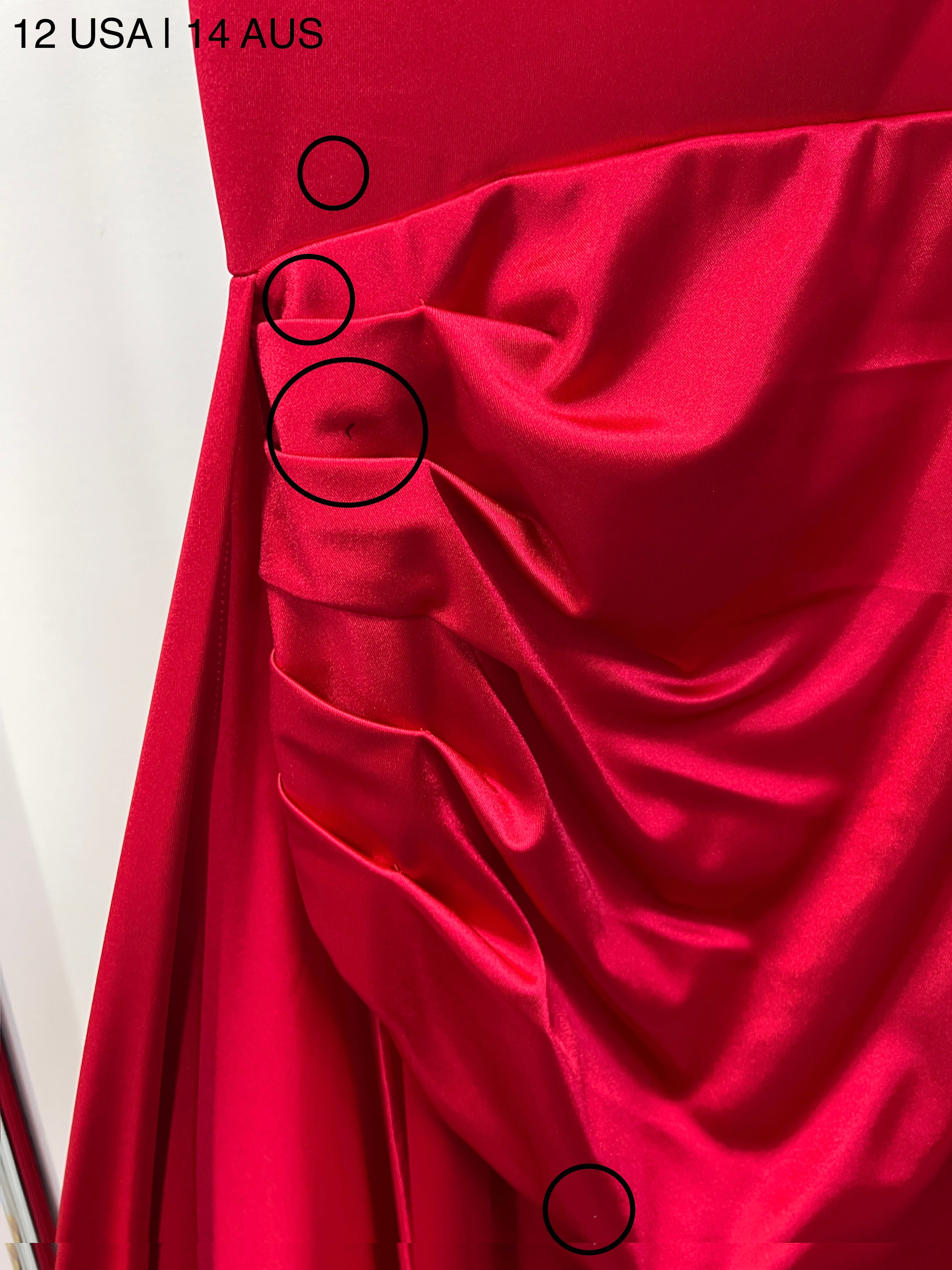 Close-up of Honey Couture CECILA Red Diamante Bustier Formal Dress, featuring ruched side detail on vibrant red fabric by Australian Designer.