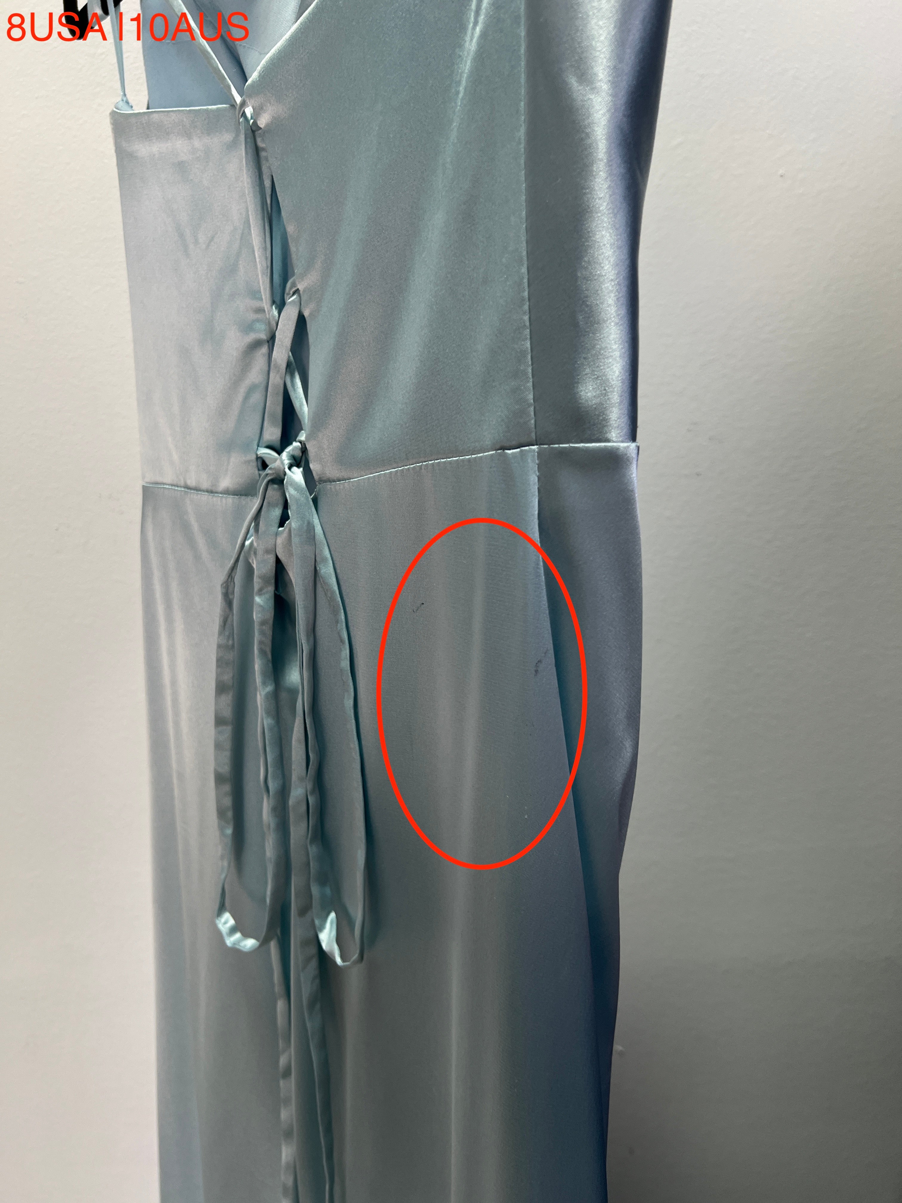 Close-up of Honey Couture QUINN Baby Blue Satin Lace Up Formal Dress with red tag and cosmetic flaw, Australian Designer, Prom Dresses