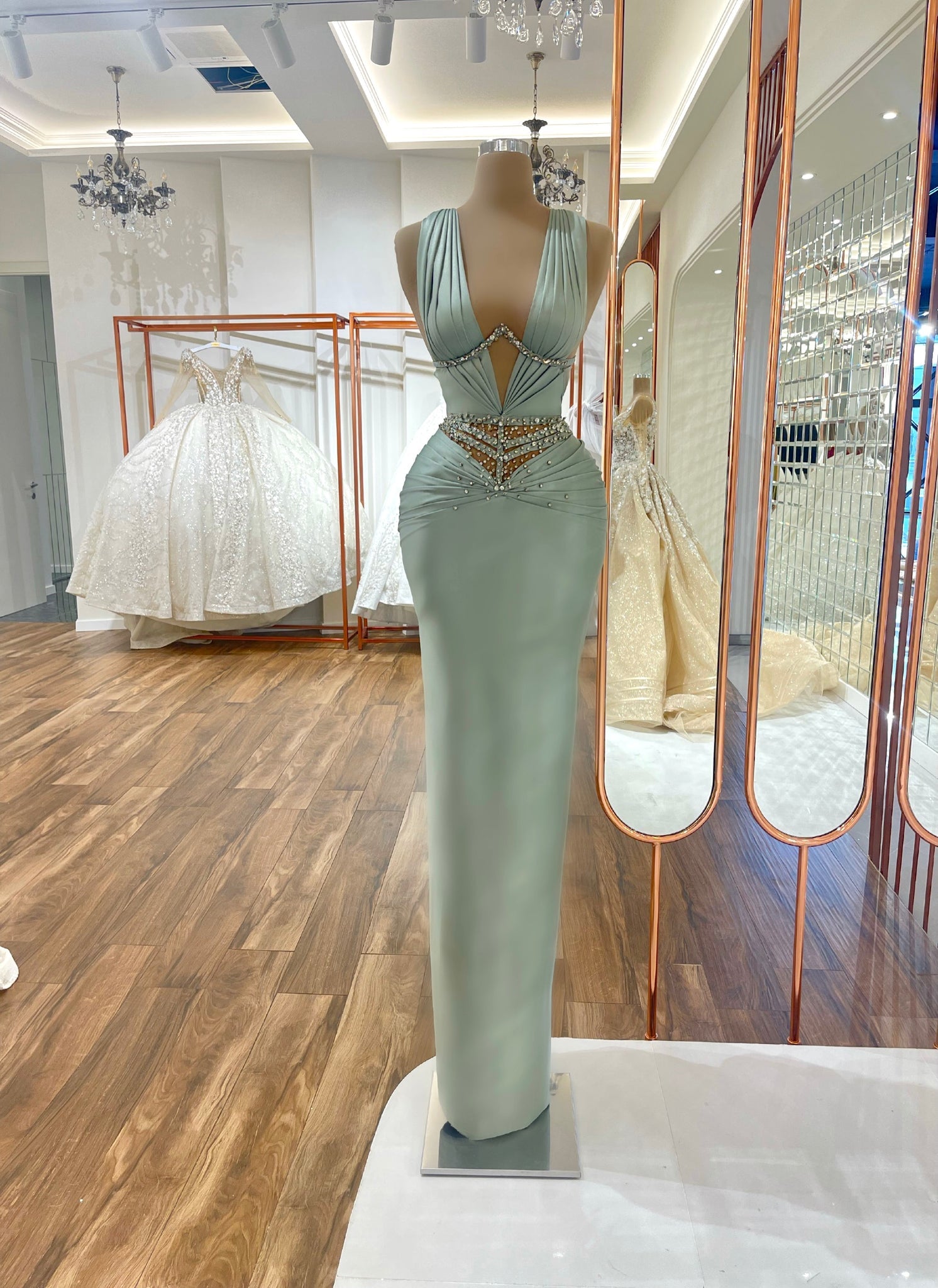 Sage green silky gown with a plunge neckline and glitter waist details, elegant for an evening event. Brisbane to Gold Coast, Australia.