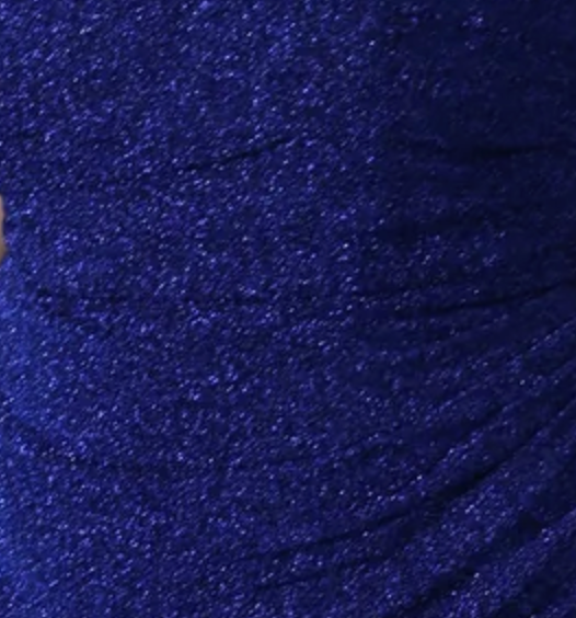 Close-up of shimmering blue fabric with ruched details, showcasing texture for curve size formal dresses. Ideal for Brisbane to Gold Coast.
