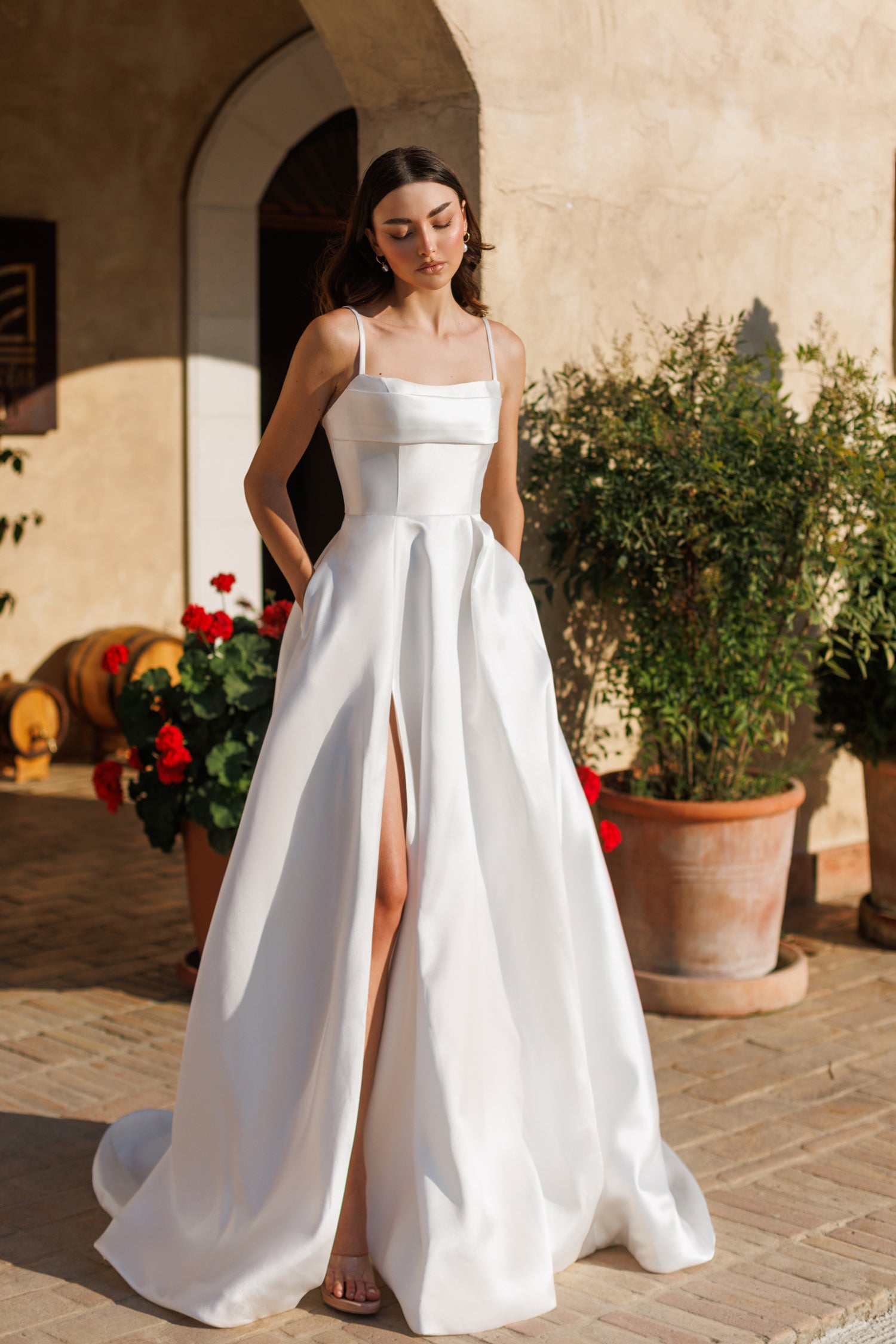 TE305 NATALIA satin wedding dress with spaghetti straps and square neckline. Elegant bridal gown from Brisbane to Gold Coast, Australia.