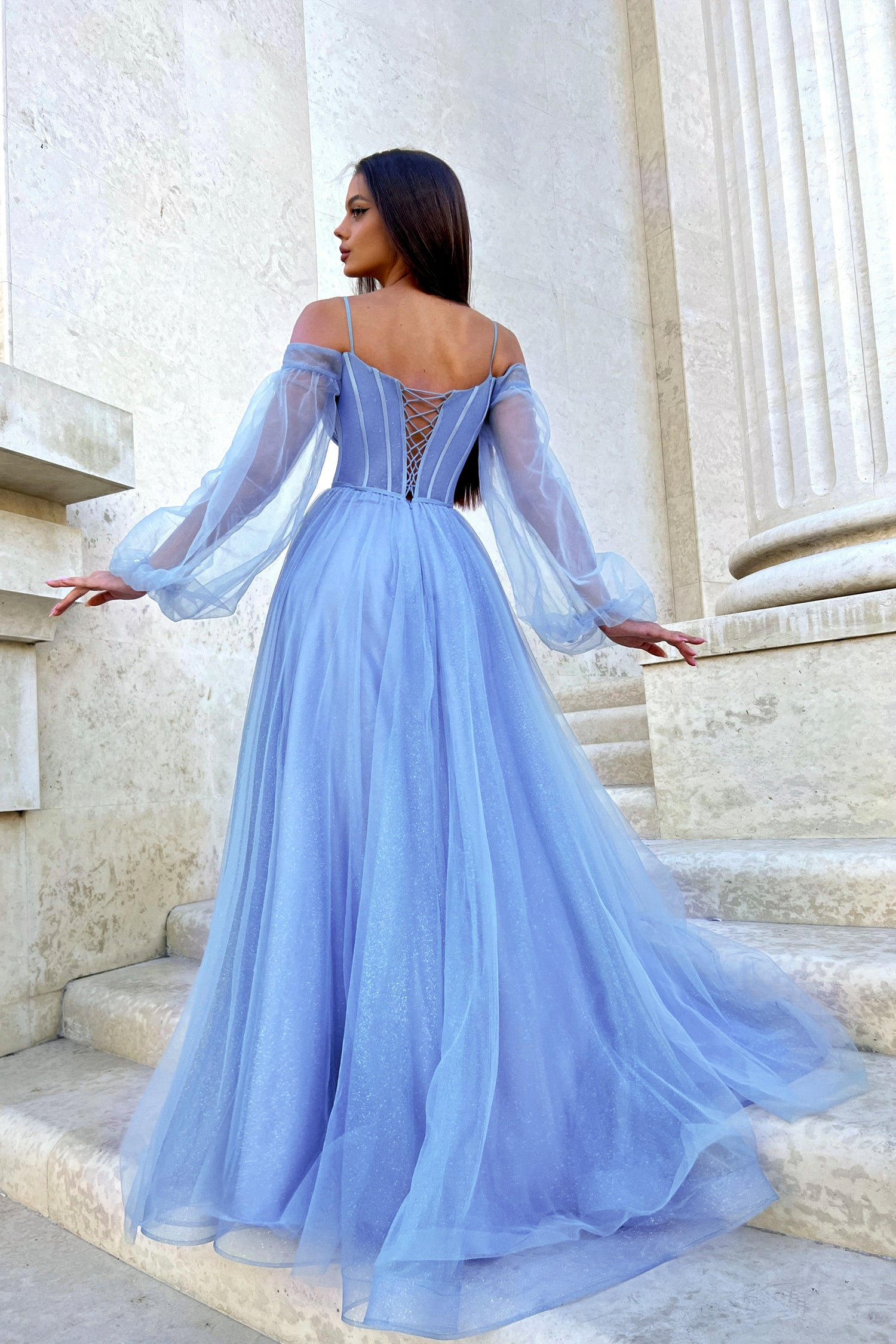 Blue off-shoulder gown with sheer sleeves, flowing cathedral train, perfect for a grand entrance. Ideal for formal events. Brisbane to Gold Coast.