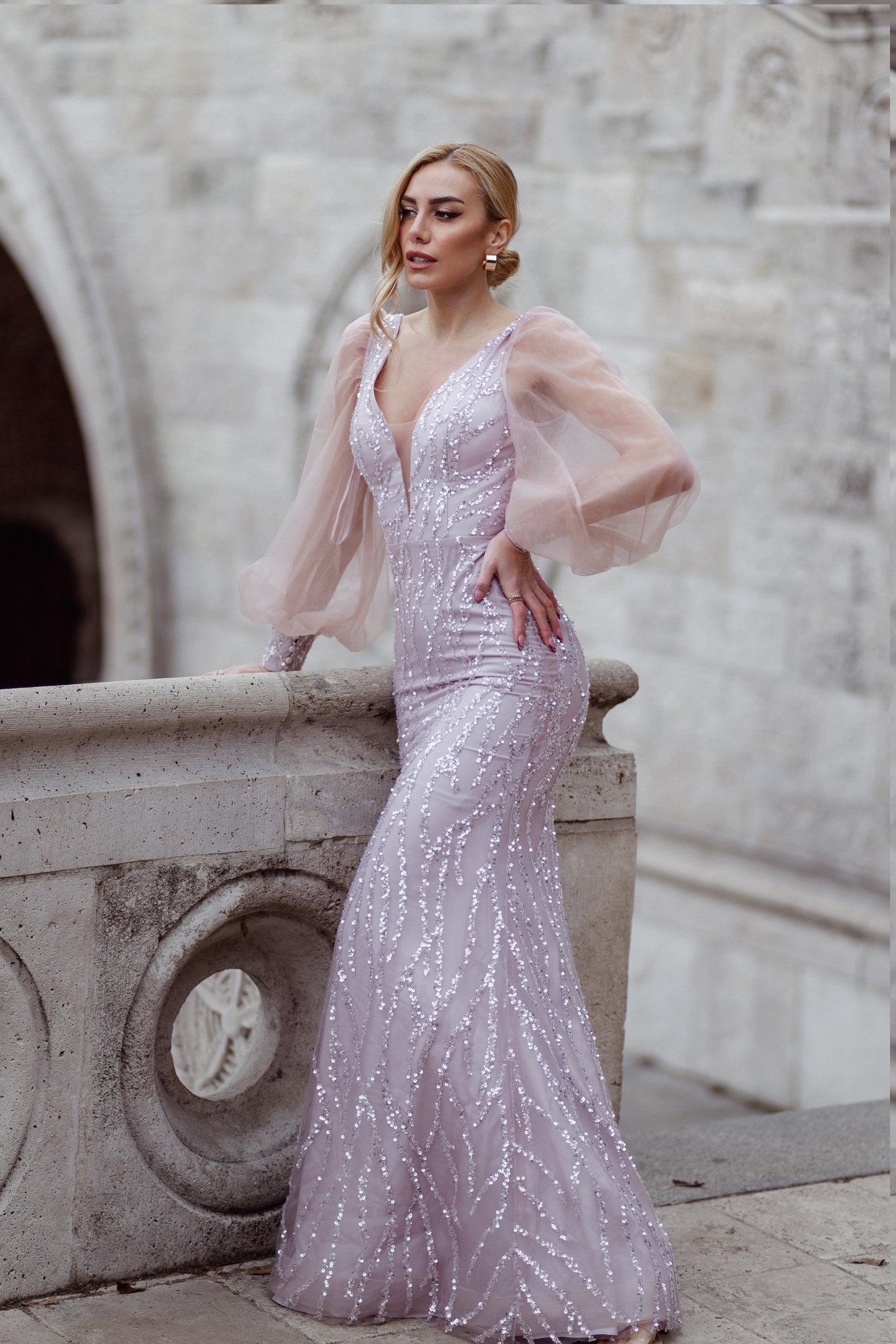 Elegant long sleeve mermaid formal dress with a deep V neckline and delicate sequin detailing. Perfect for weddings, from Brisbane to Gold Coast.