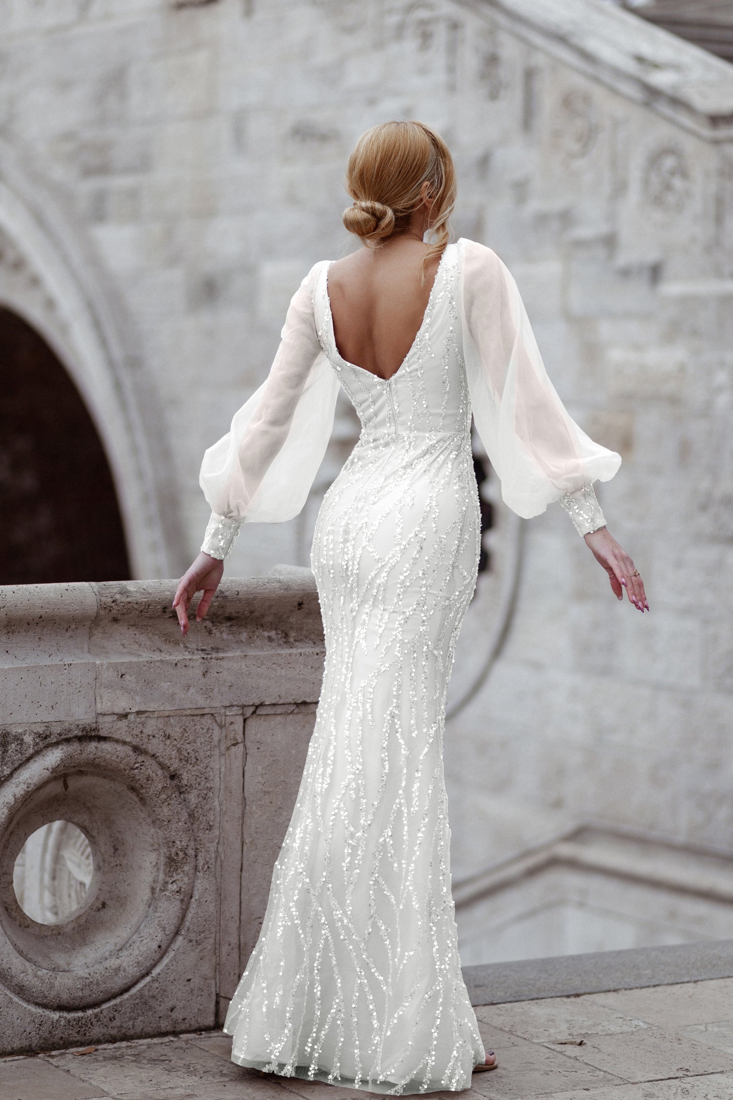 TINA HOLLY COUTURE TK209 off-white long sleeve mermaid formal dress with a deep V-neckline and trumpet train, Brisbane to Gold Coast.