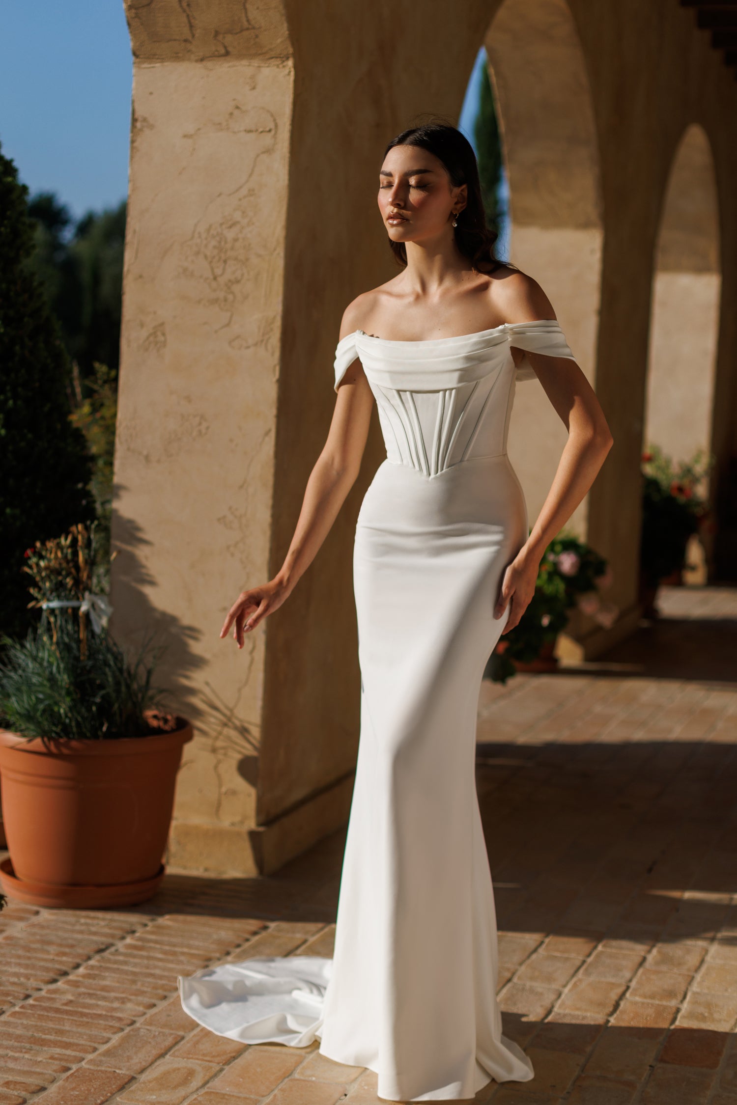 VANESSA elegant off-shoulder corset bridal gown, off-white fabric, styled for modern brides. Brisbane to Gold Coast, Australia.