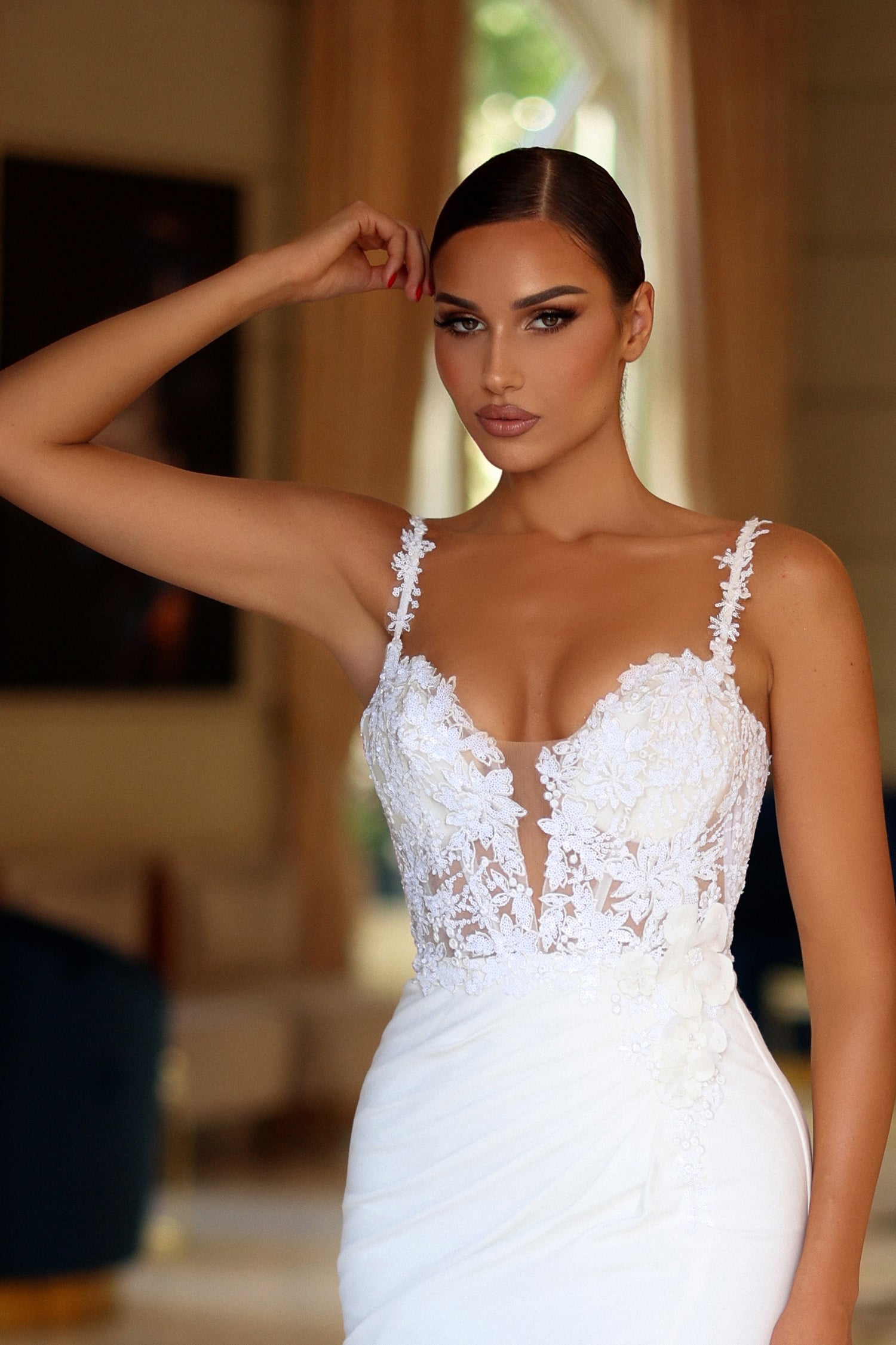 Ivory bridal dress with lace bodice and floral appliqués, highlighting an elegant off-the-shoulder design. Suitable for weddings in Brisbane to Gold Coast.