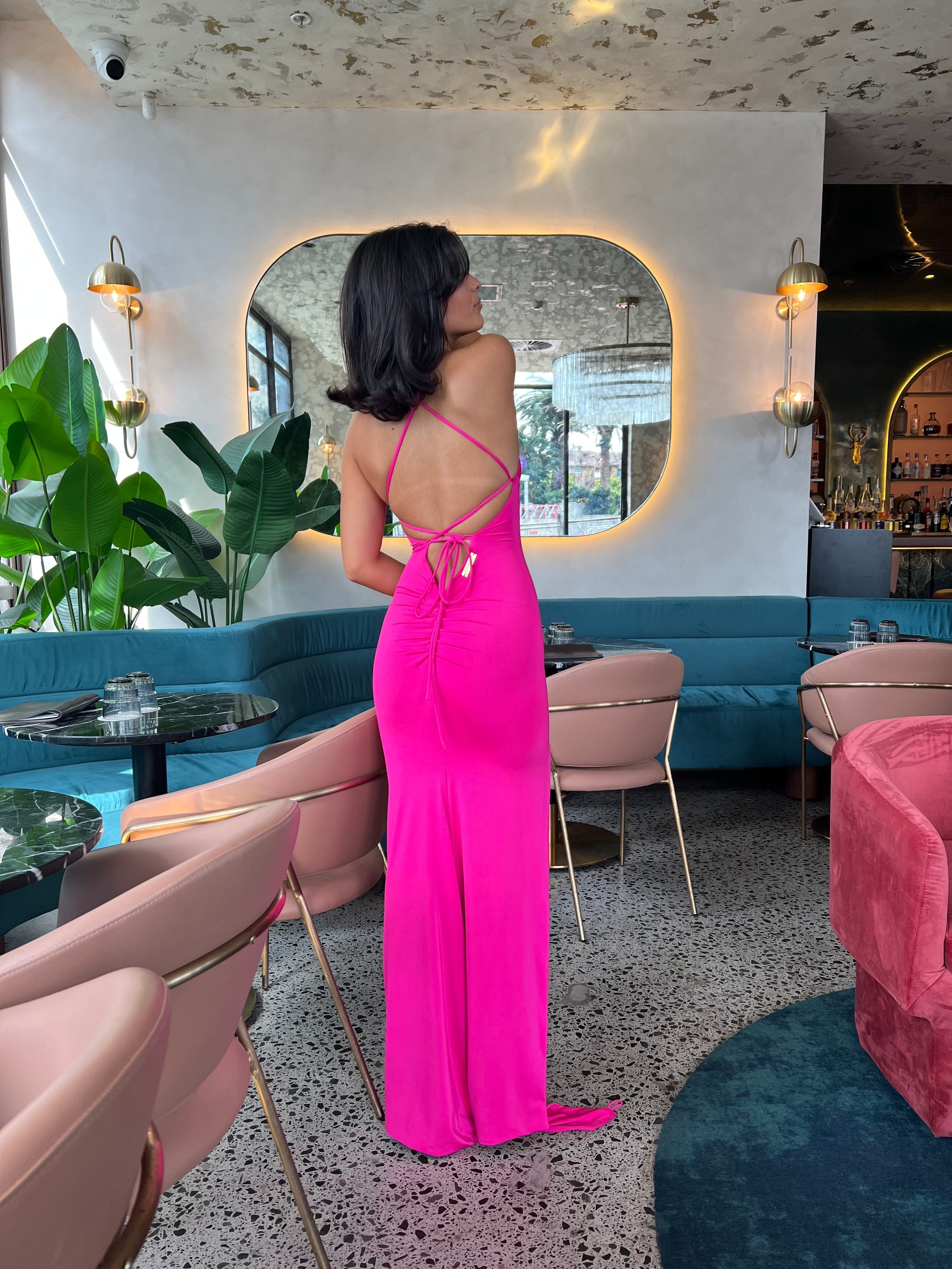 Amy Taylor prom dress - hot pink bandage fabric with backless corset fit, halter neckline, and bodycon silhouette by Australian designer.