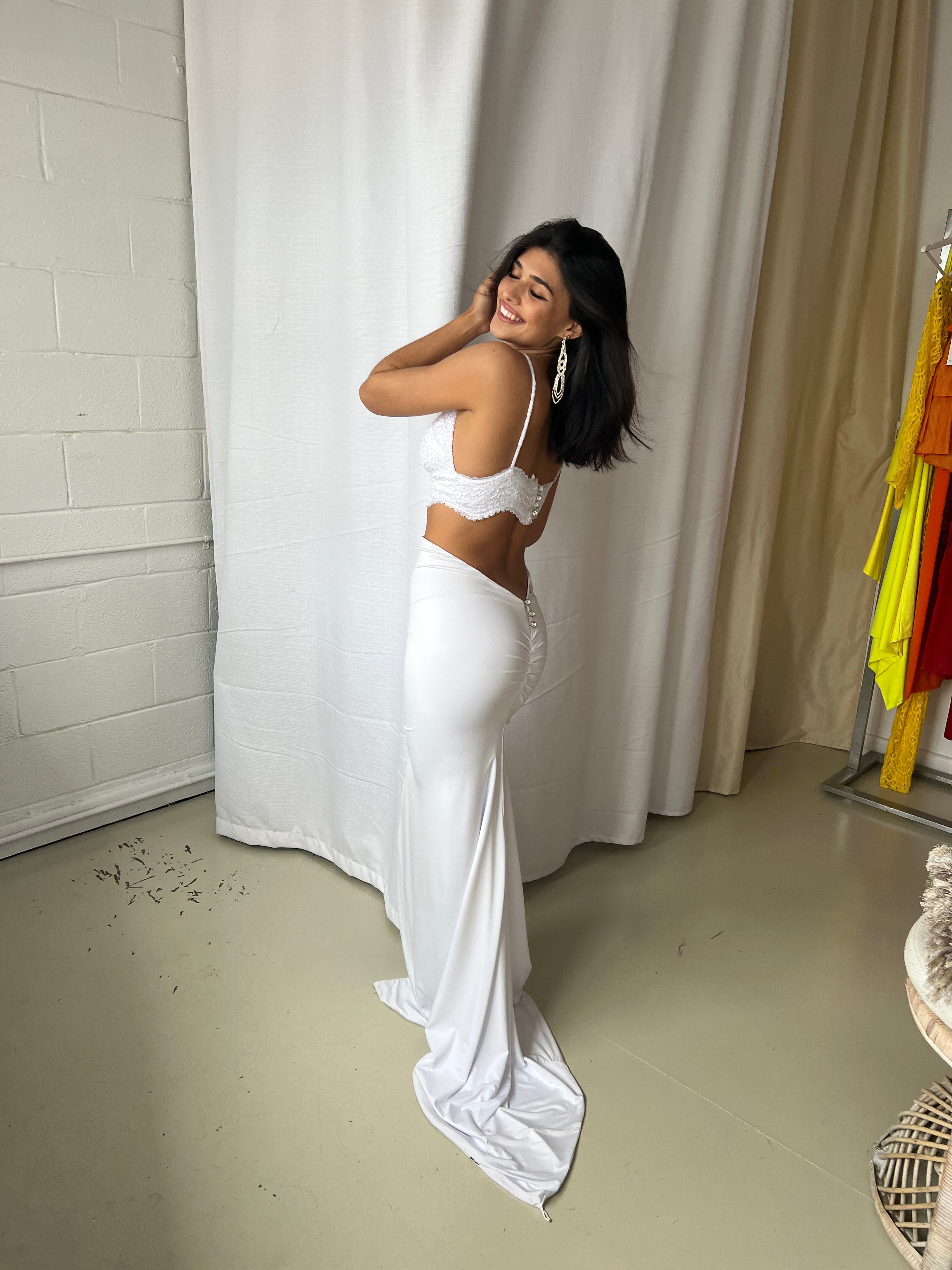 Amy Taylor OCEANS OF PARADISE formal set featuring a slinky lace bralette and high-waisted skirt with a bodycon silhouette.