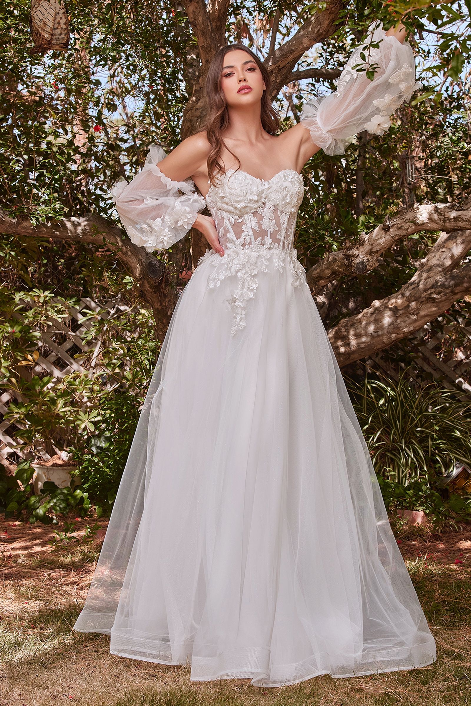 Divinity Bridal AURORA SERAPHINE off white tulle floral corset wedding dress, affordable bridal elegance, outdoor setting.