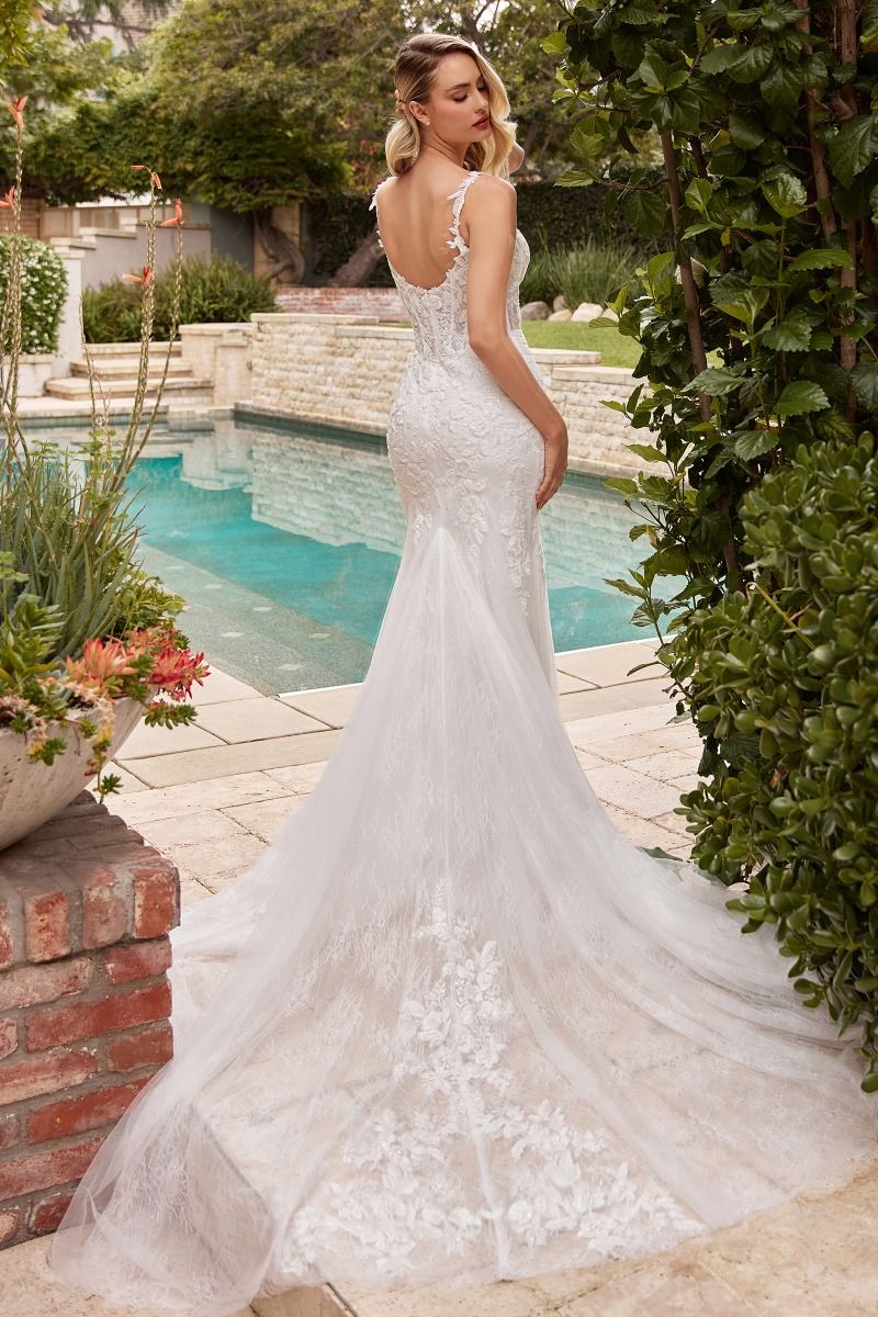 Divinity Bridal LIORA mermaid wedding dress with boned bodice and lace by poolside. Affordable bridal gown in Australia.