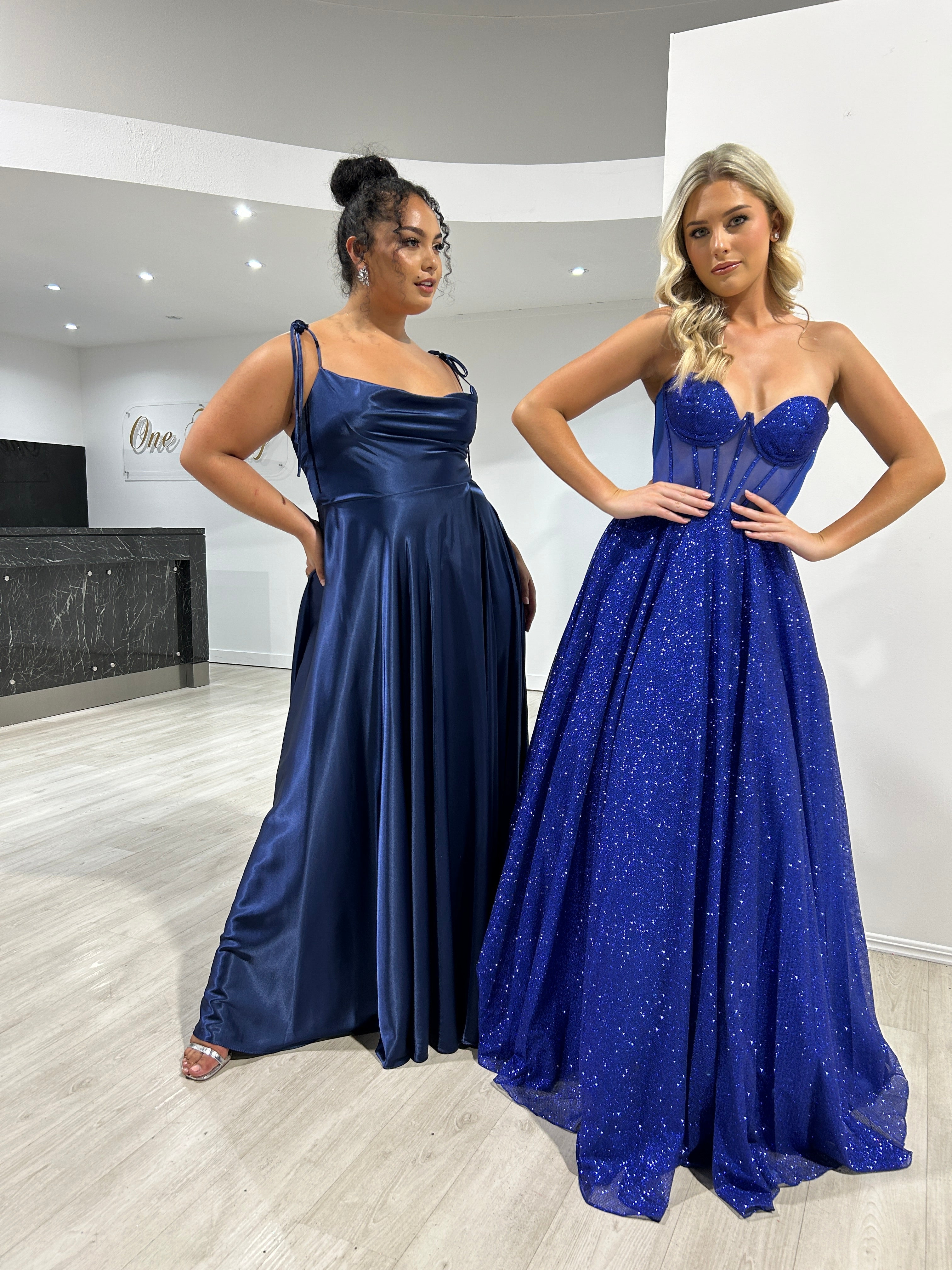 XENA silky tie-up A-line formal dress, featuring a cowl neckline and spaghetti ties. Glam blue evening gown with glitter detail. Brisbane to Gold Coast.