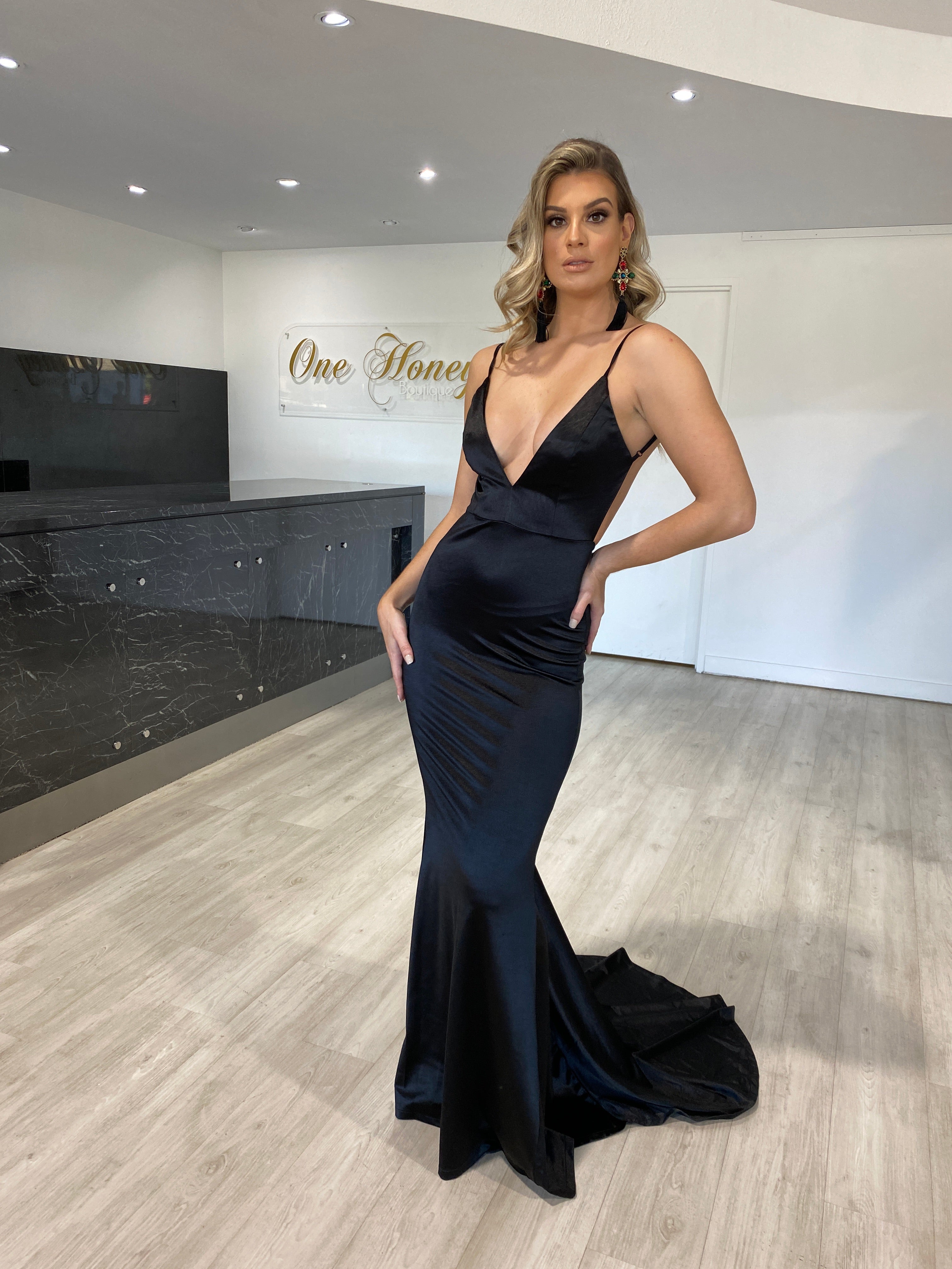 Elegant woman wearing Honey Couture MILEE Low Back Mermaid Evening Gown, Australian Designer prom dress with silky stretch fabric.