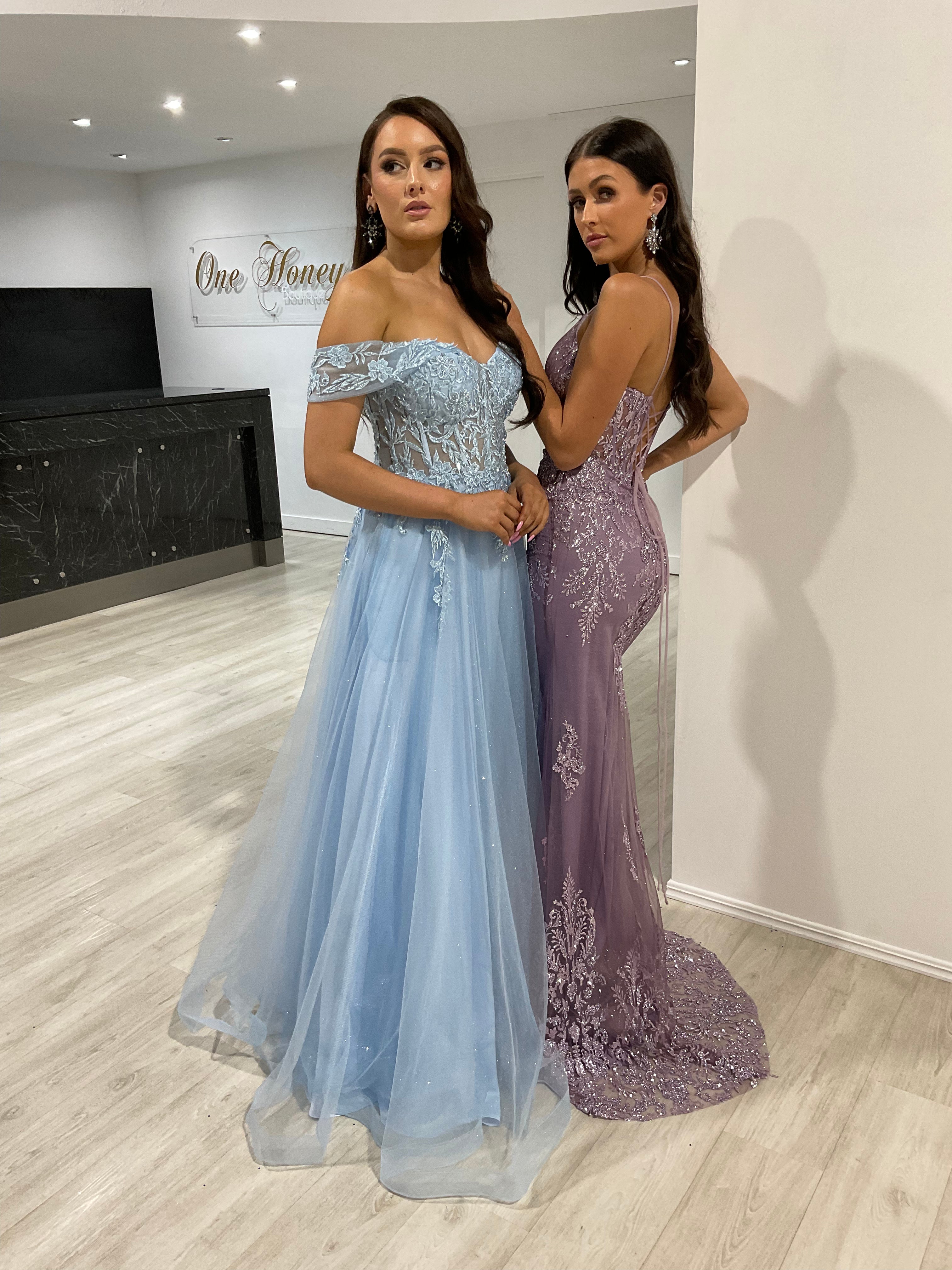 Elegant off-the-shoulder blue and purple lace evening gowns, perfect for formal events. Brisbane to Gold Coast.