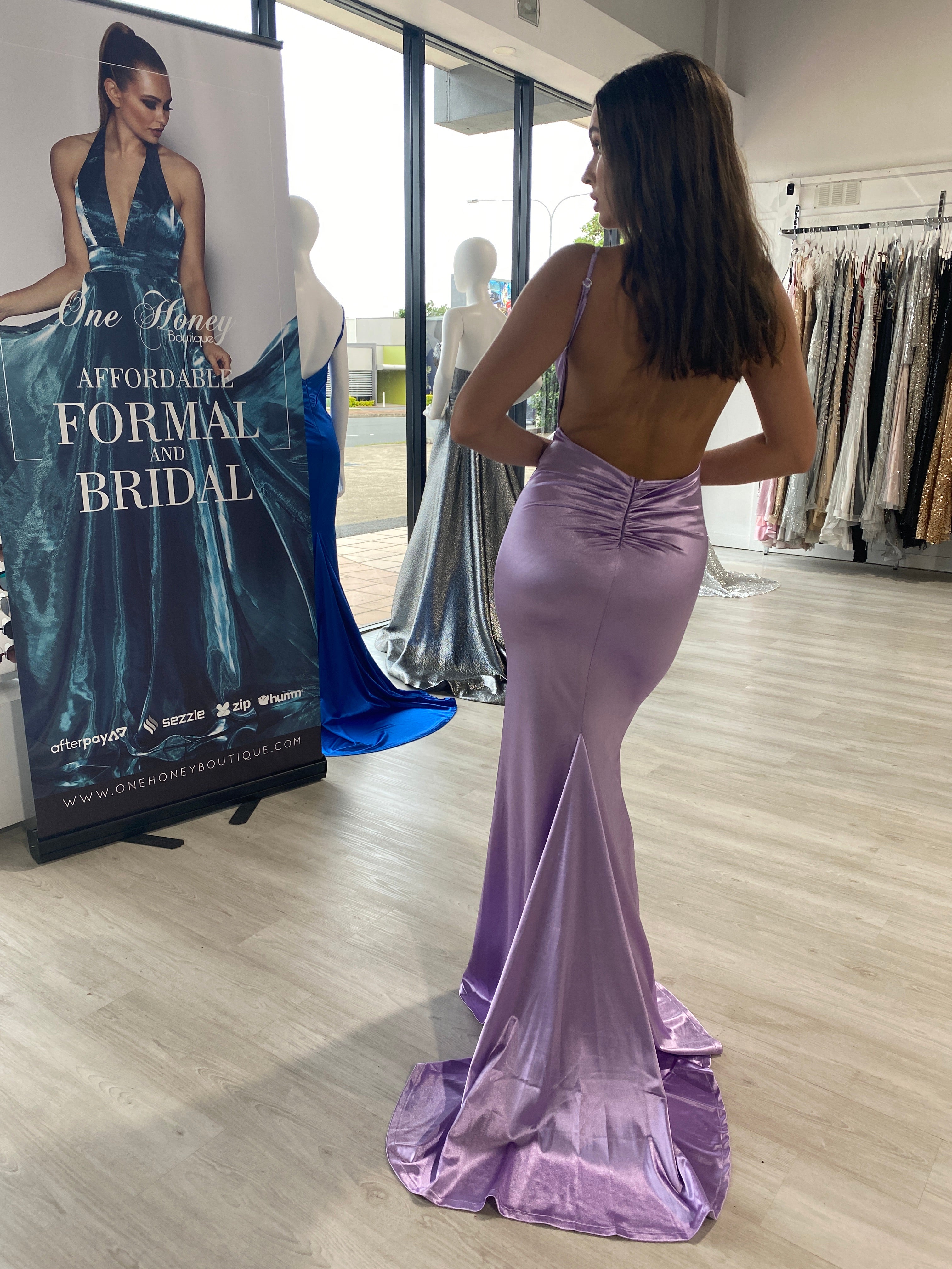 Honey Couture MILEE mermaid gown with low back, ruching, leg split, and silky stretch fabric. Designed by Australian Designer for prom elegance.