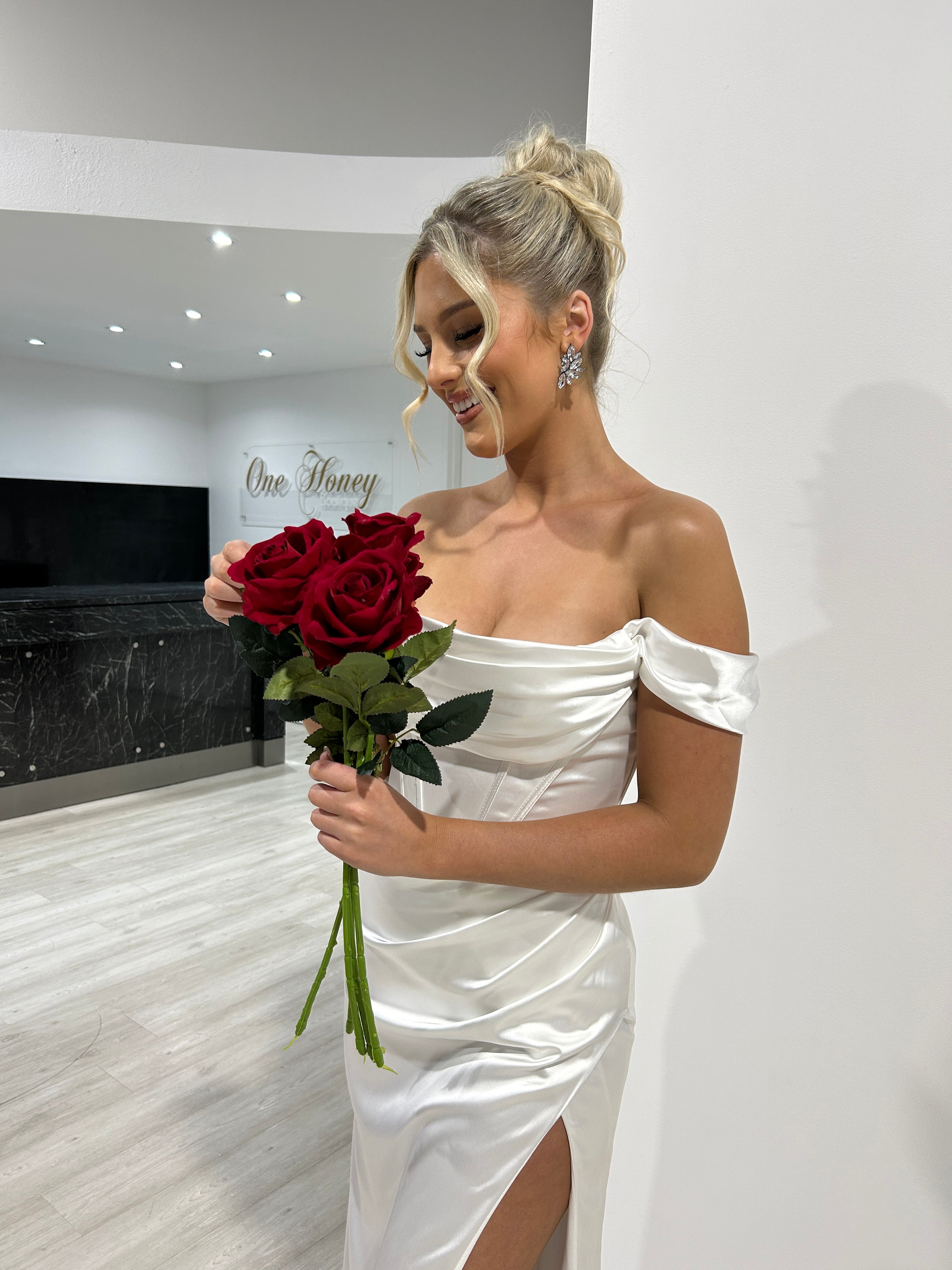 CECE off white satin off-the-shoulder corset bustier formal dress with pleated cowl neckline, perfect for weddings. Brisbane to Gold Coast.