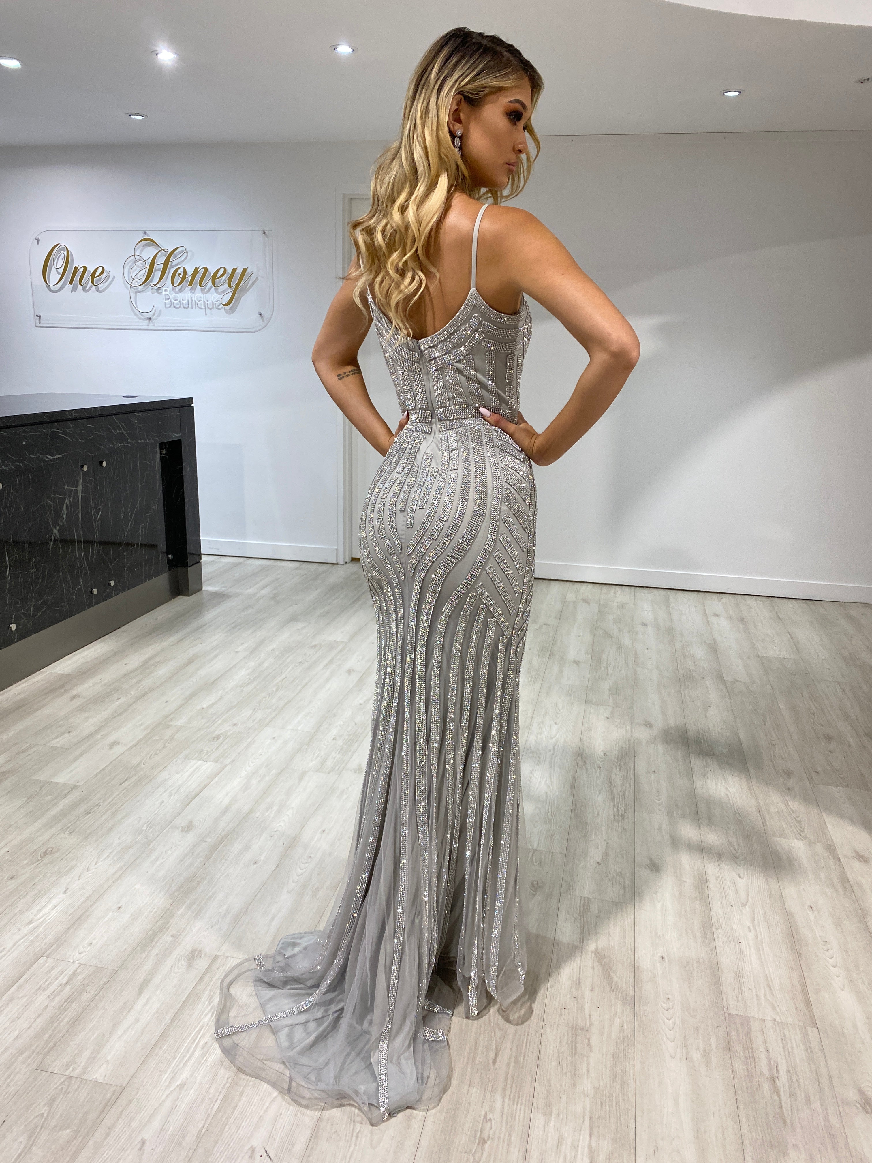 Woman wearing Honey Couture DIAMONDS Gold Sequin Mermaid Gown, Australian Designer, perfect for prom or evening. Affordable elegance.