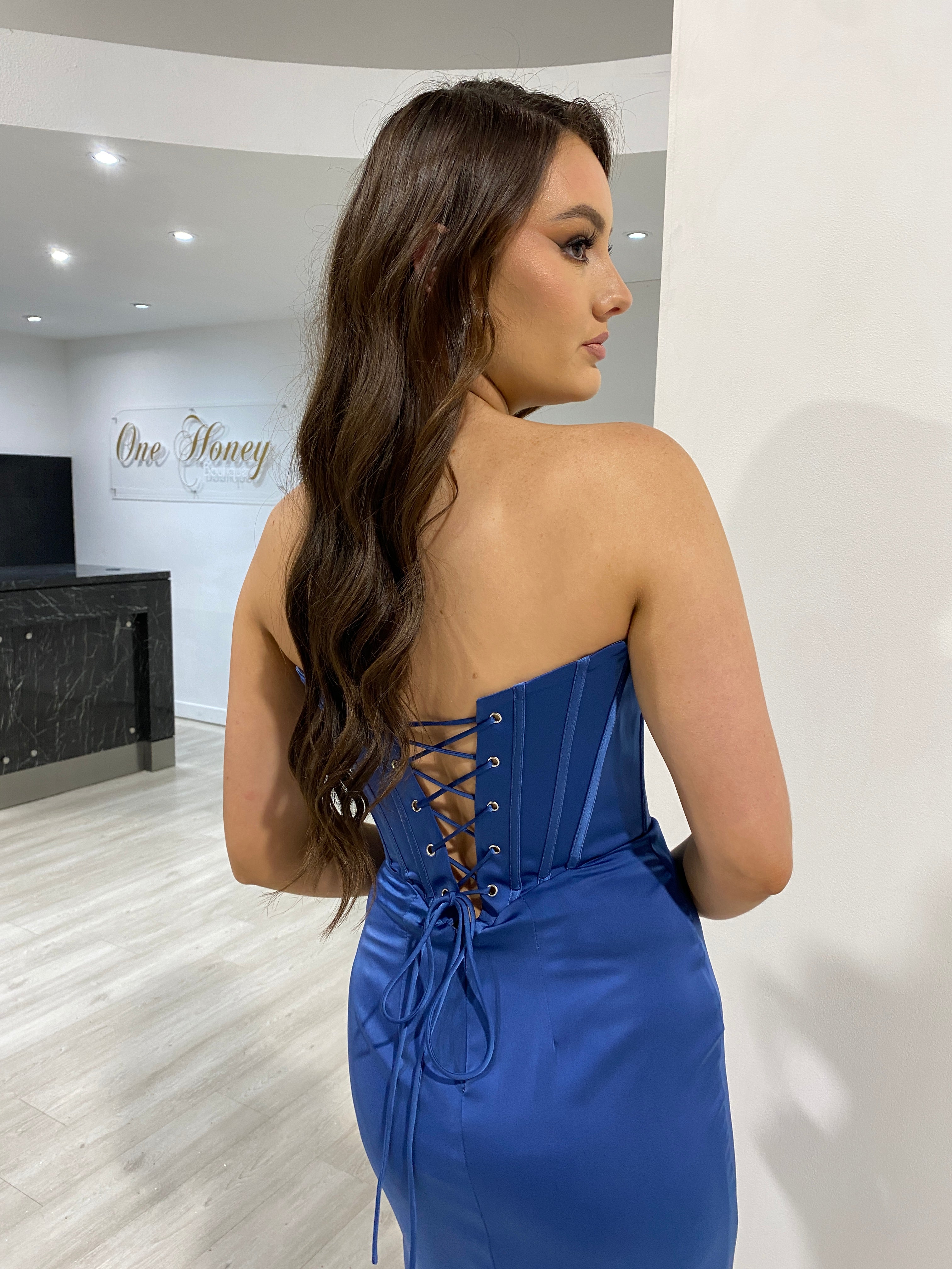 TYRA blue boned corset prom dress with lace-up back, showcasing elegant satin finish. Bridesmaid elegance from Brisbane to Gold Coast, Australia.