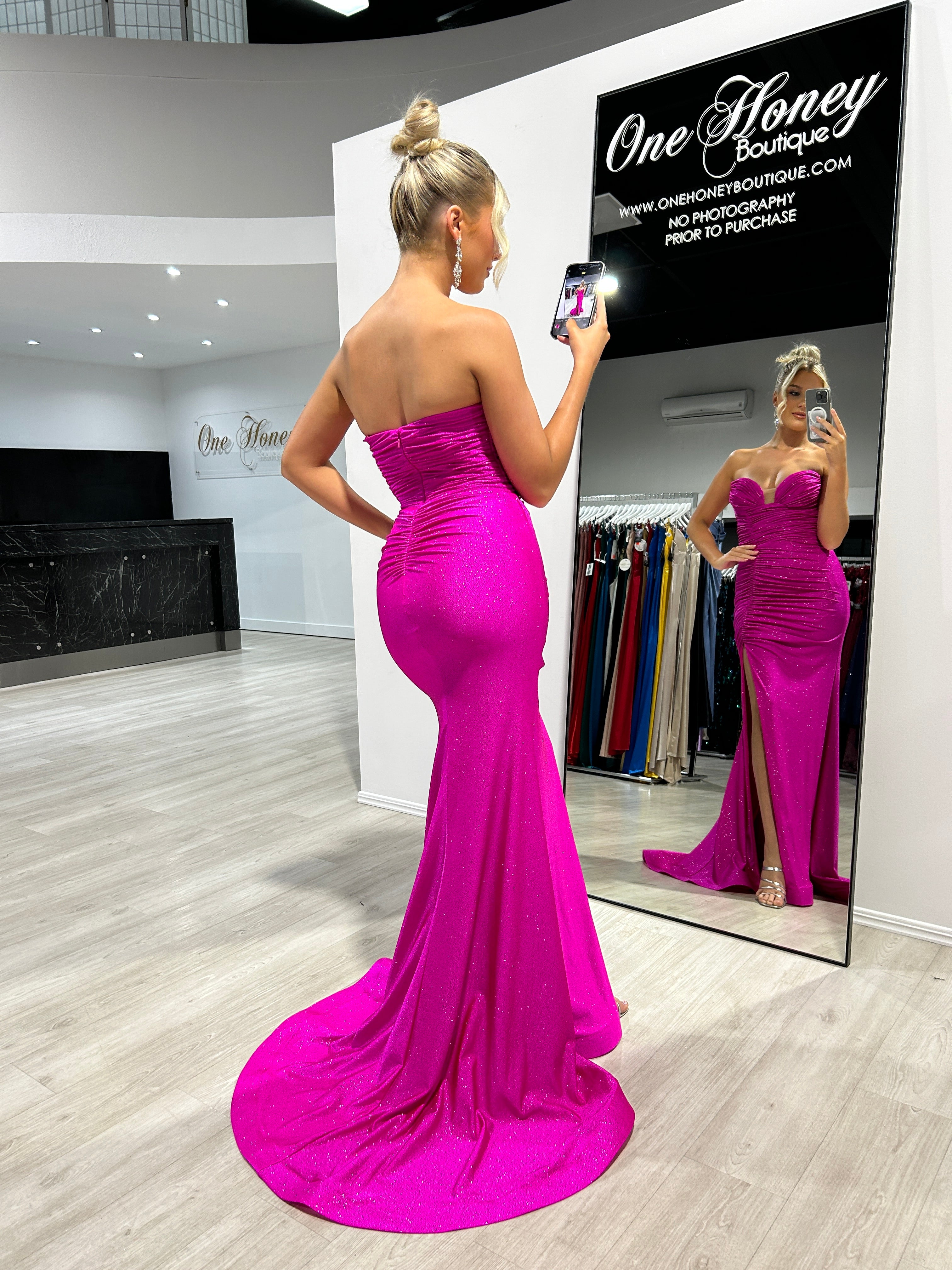 JESIKA Glitter Strapless Mermaid Dress with fitted silhouette in mirror reflection at boutique. Evening gown, Brisbane to Gold Coast.