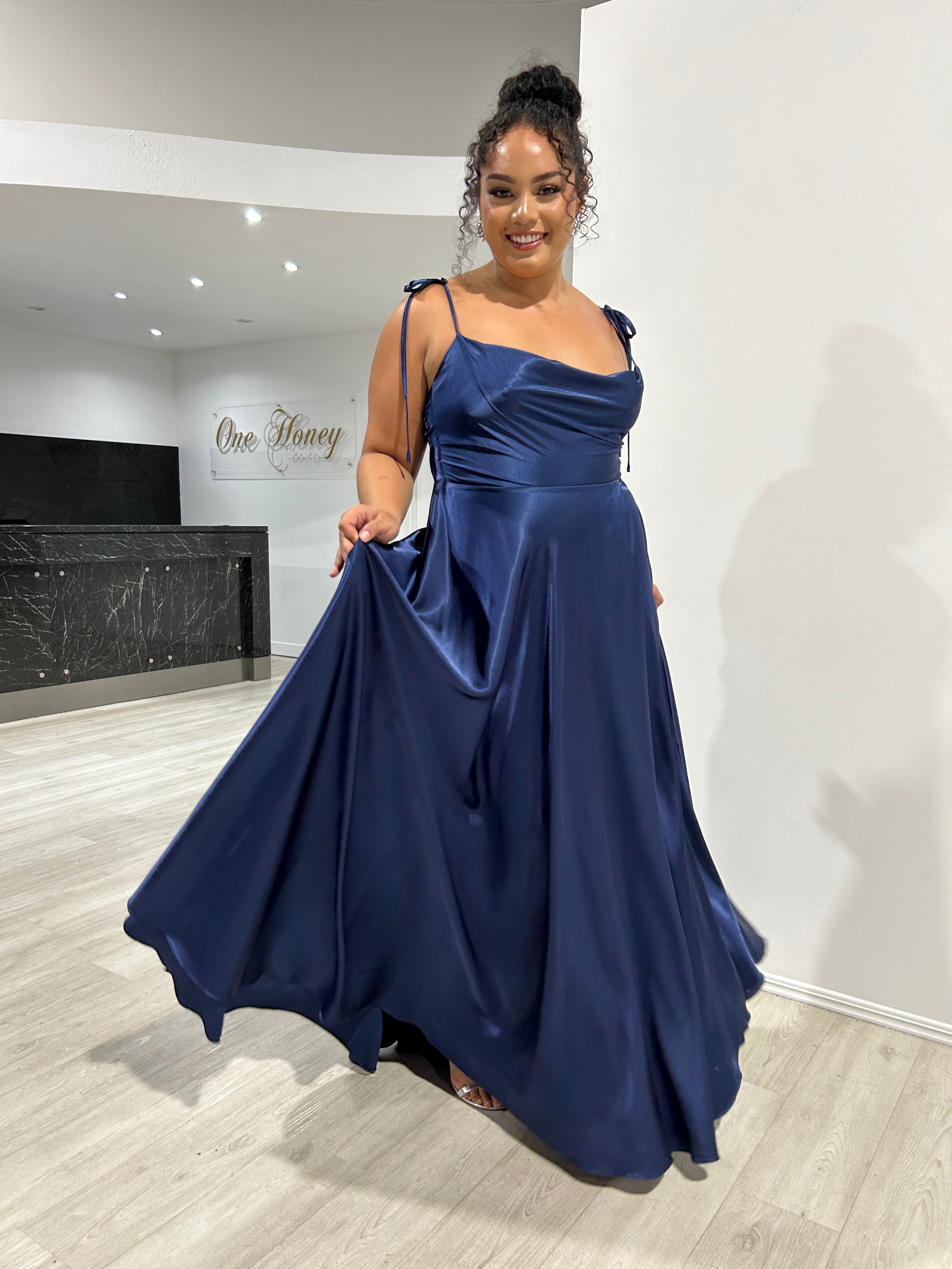 XENA Silky Tie Up A-Line Bridesmaid Dress with adjustable straps and cowl neckline, worn at a formal event, Brisbane to Gold Coast.