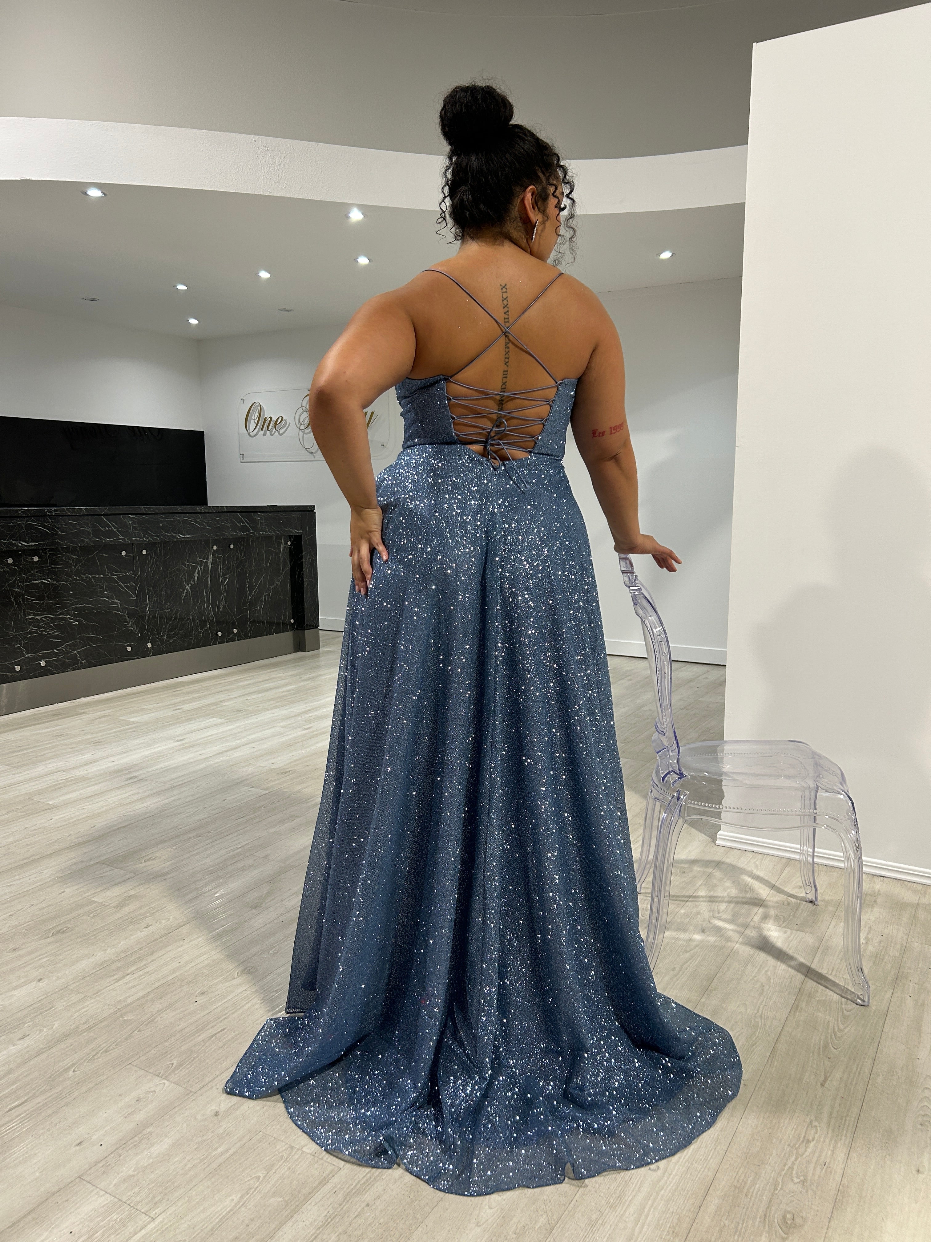 DREYA Curve Corset blue glitter ball gown with a lace-up back, perfect for school formal. Brisbane to Gold Coast, Australia.