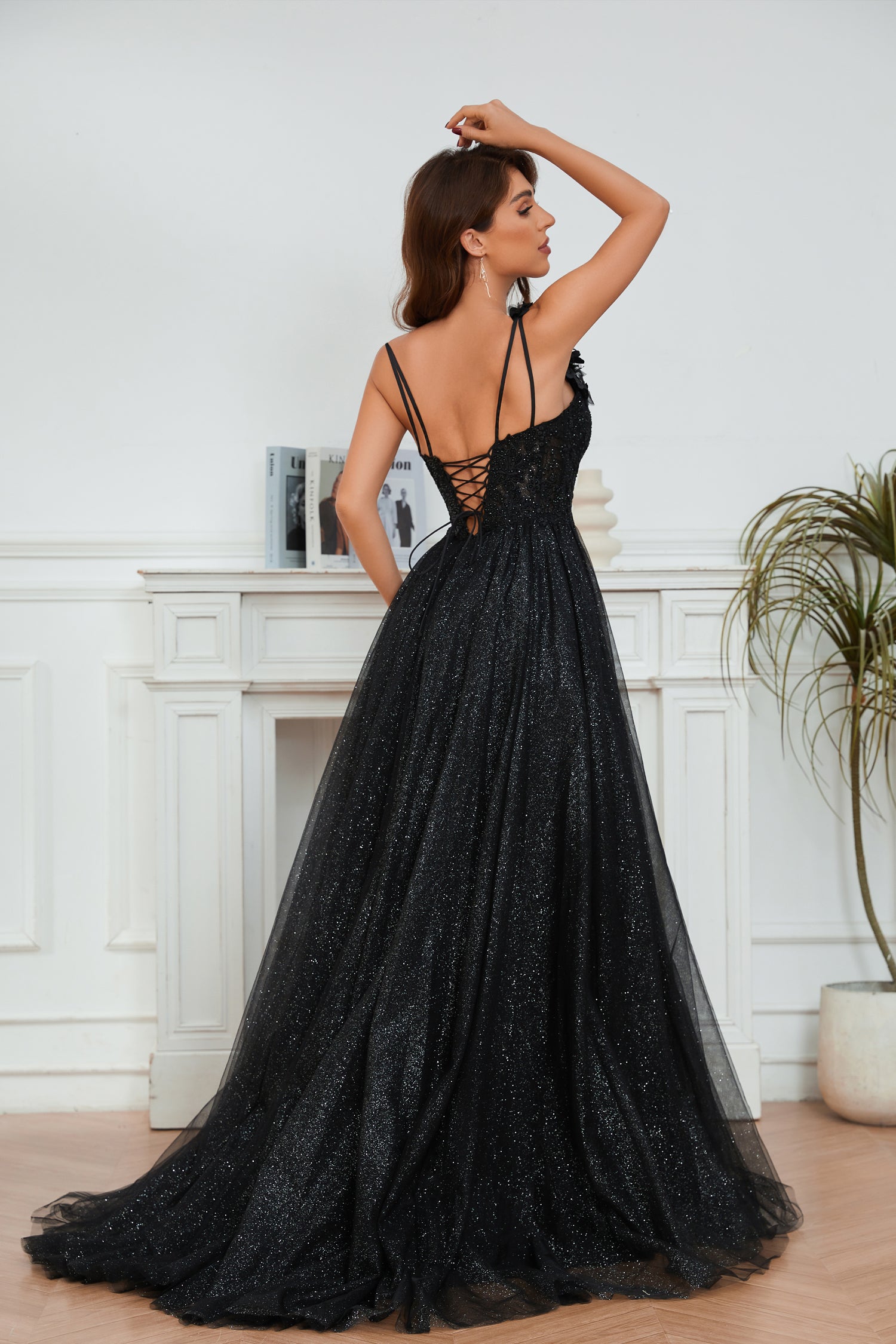 Black lace-up glitter tulle evening gown with spaghetti straps, perfect for formal occasions. Ideal from Brisbane to Gold Coast.