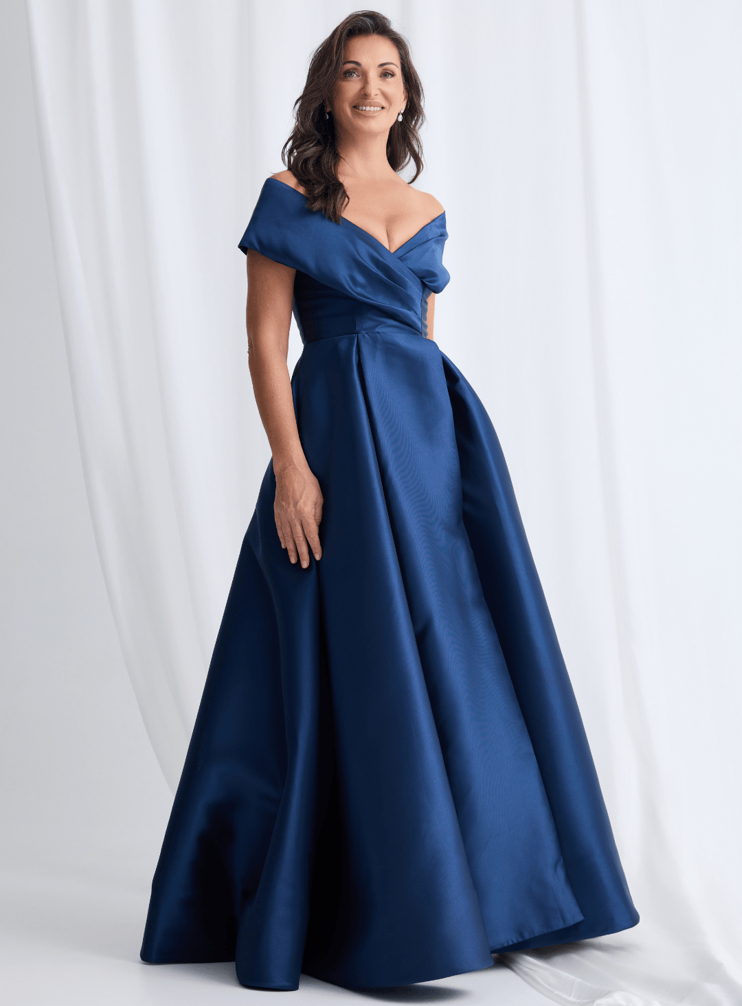 navy off the shoulder mother of the bride dress Trellis Lane Eloisa Maxi – One Honey Blue / 24 AUS model_sep21_ari shoulder pleated bodice Alice in Wonderland | Color:After Dark Print