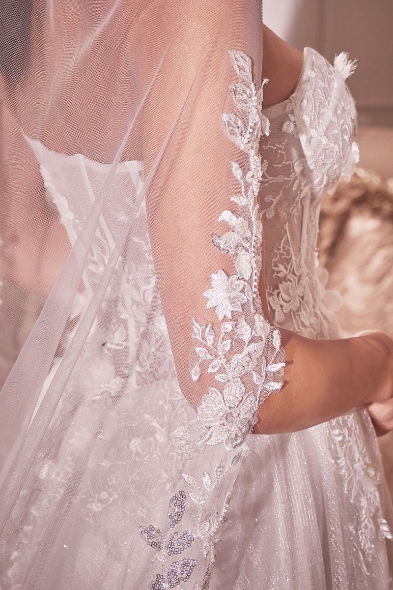 Seville Off White Beaded Floral Edge Chapel Wedding Bridal Veil on lace wedding dress, perfect for affordable bridal style.