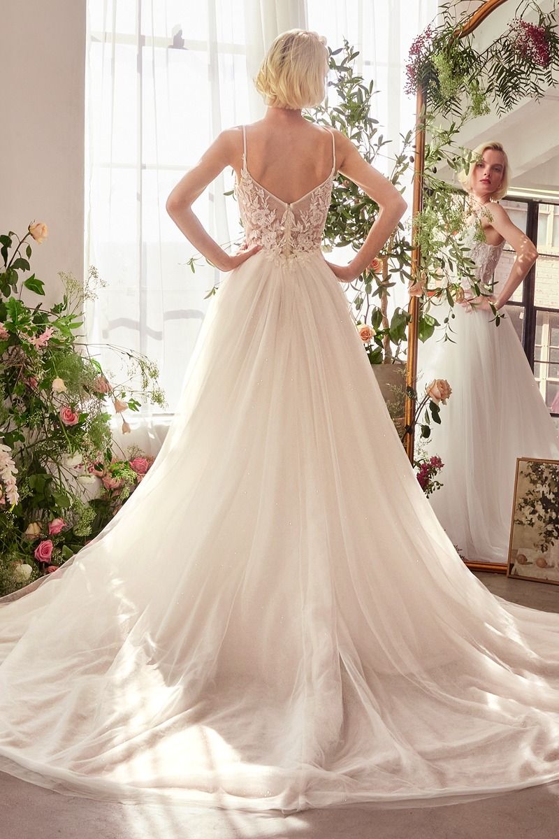 Divinity Bridal BRUNA lace and tulle affordable wedding dress with floral lace back, thin straps, and flowing train.