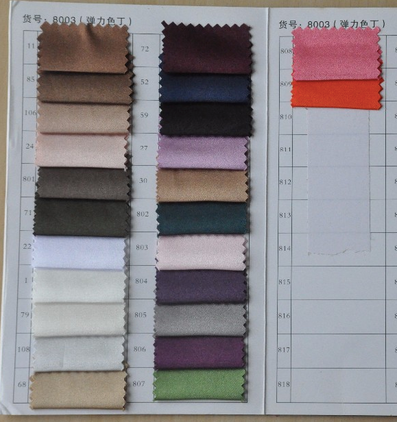 Fabric color chart with various shades for the LUNA Glitter Overlay Mermaid Dress by Honey Couture, featuring 24 color options.