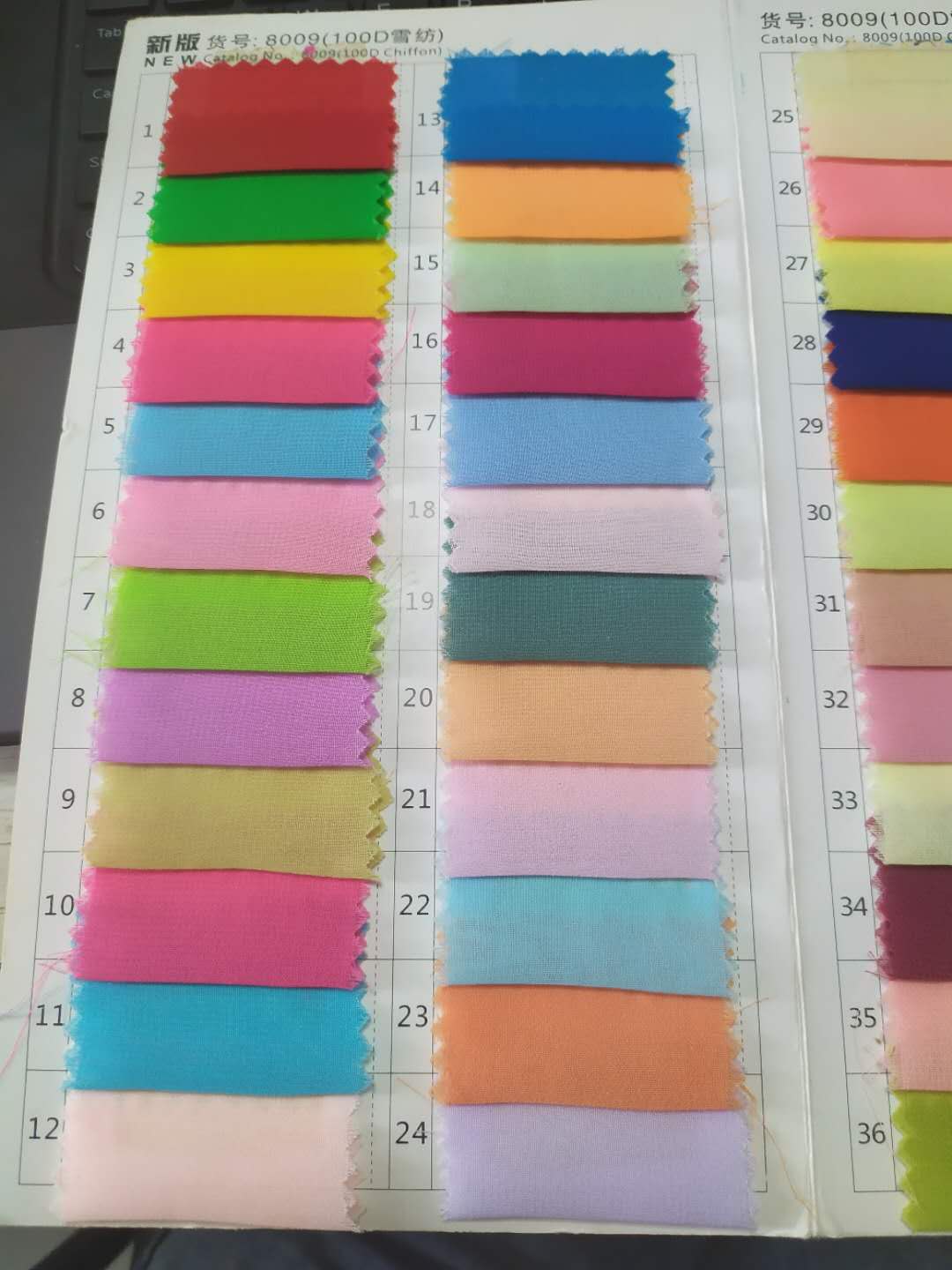 Fabric color chart showing various vibrant shades for customization options in formal dresses, ideal for prom and evening gowns.