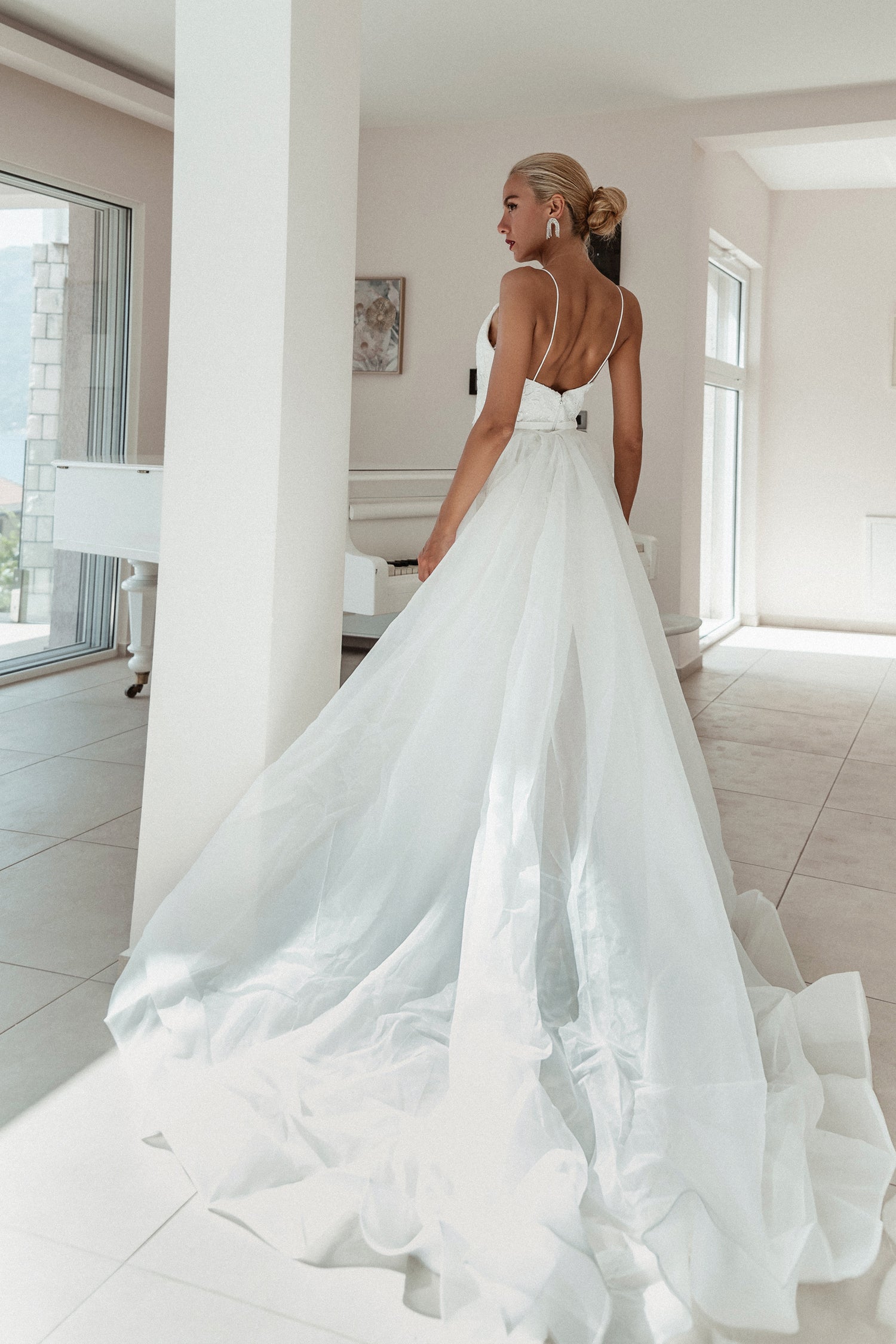 Bridal gown with dramatic train and elegant V back, fitted mermaid silhouette. Tina Holly Couture BB022W wedding dress Brisbane to Gold Coast.