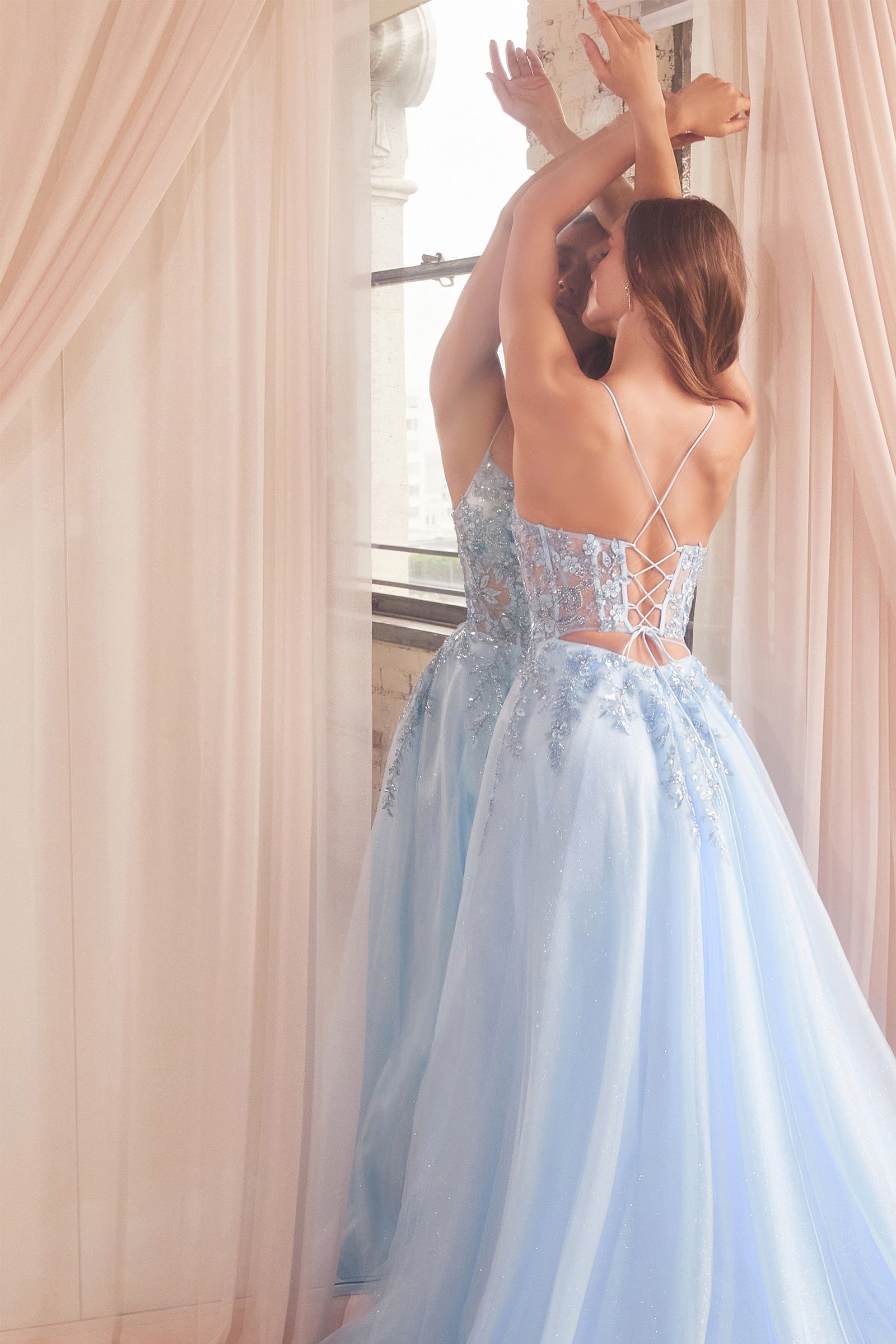 STARI baby blue tulle ball gown with a lace-up back, sleeveless design, and bead embellishments. Perfect for formal events. Brisbane to Gold Coast.