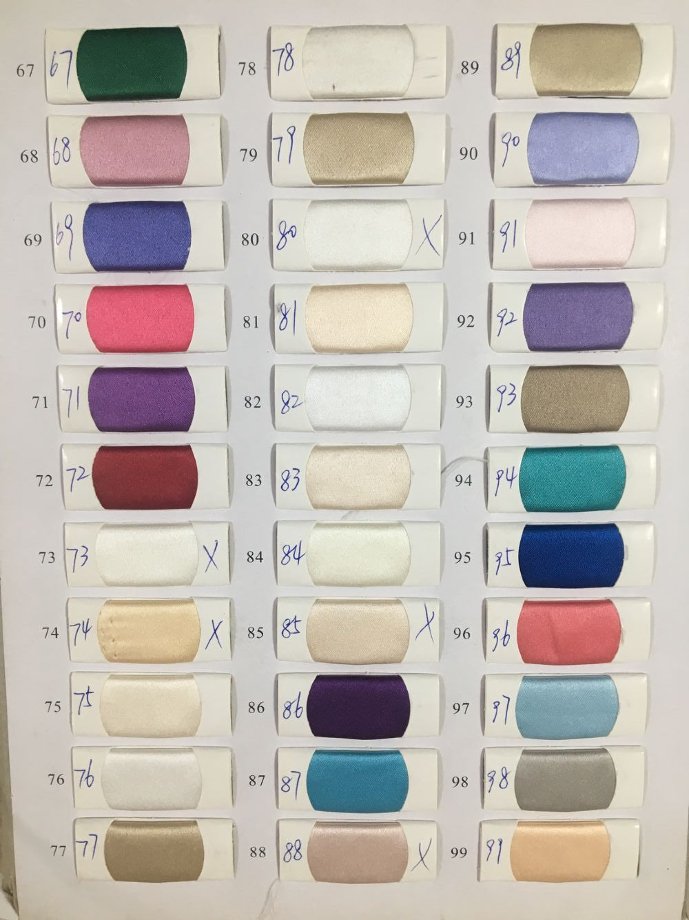 Fabric color chart displaying various swatches for the Honey Couture DAISY dress available in customizable options for formal events.