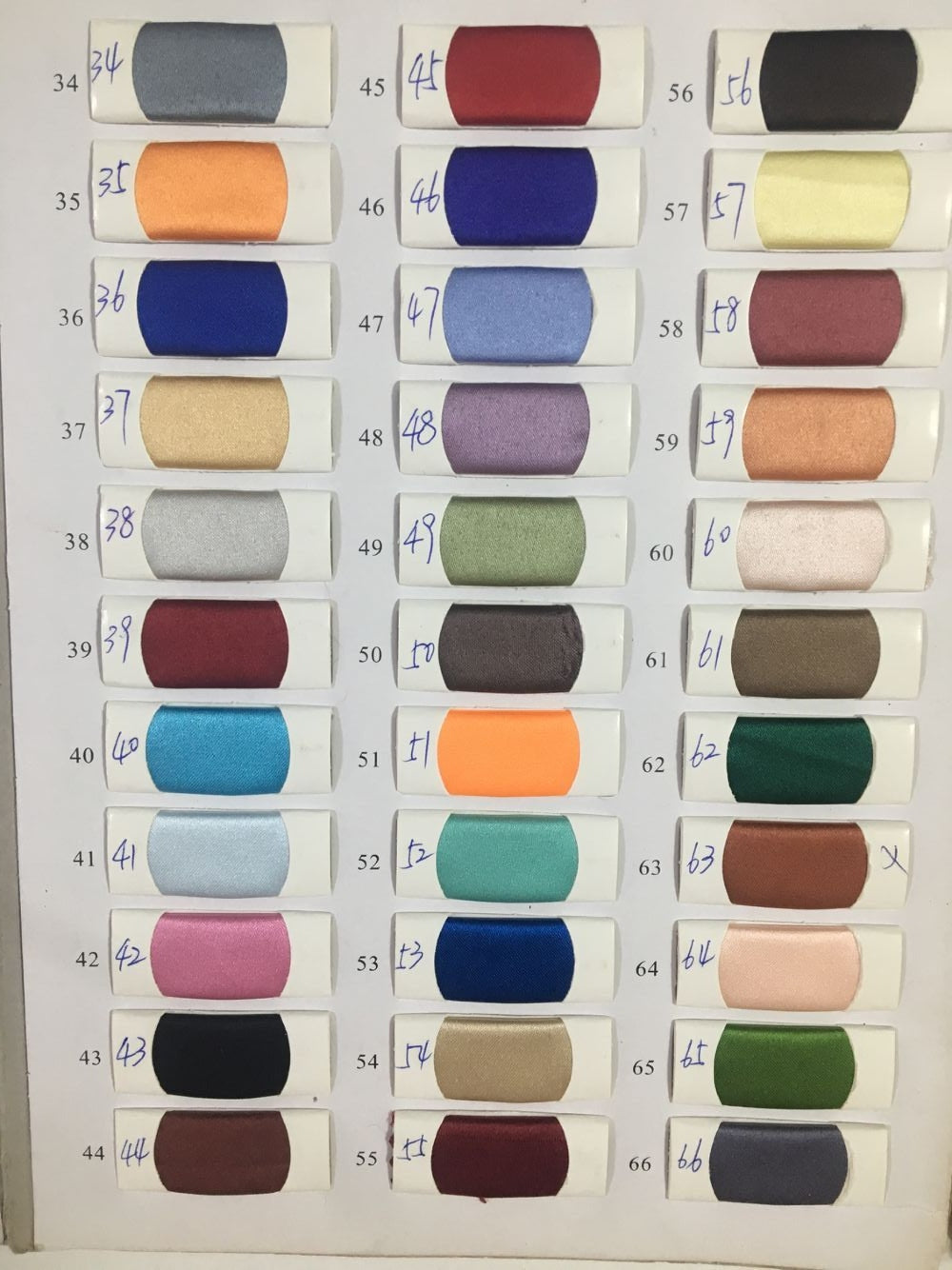 Color chart for custom Honey Couture DAISY formal dress showing various fabric swatches and numbered shade options.