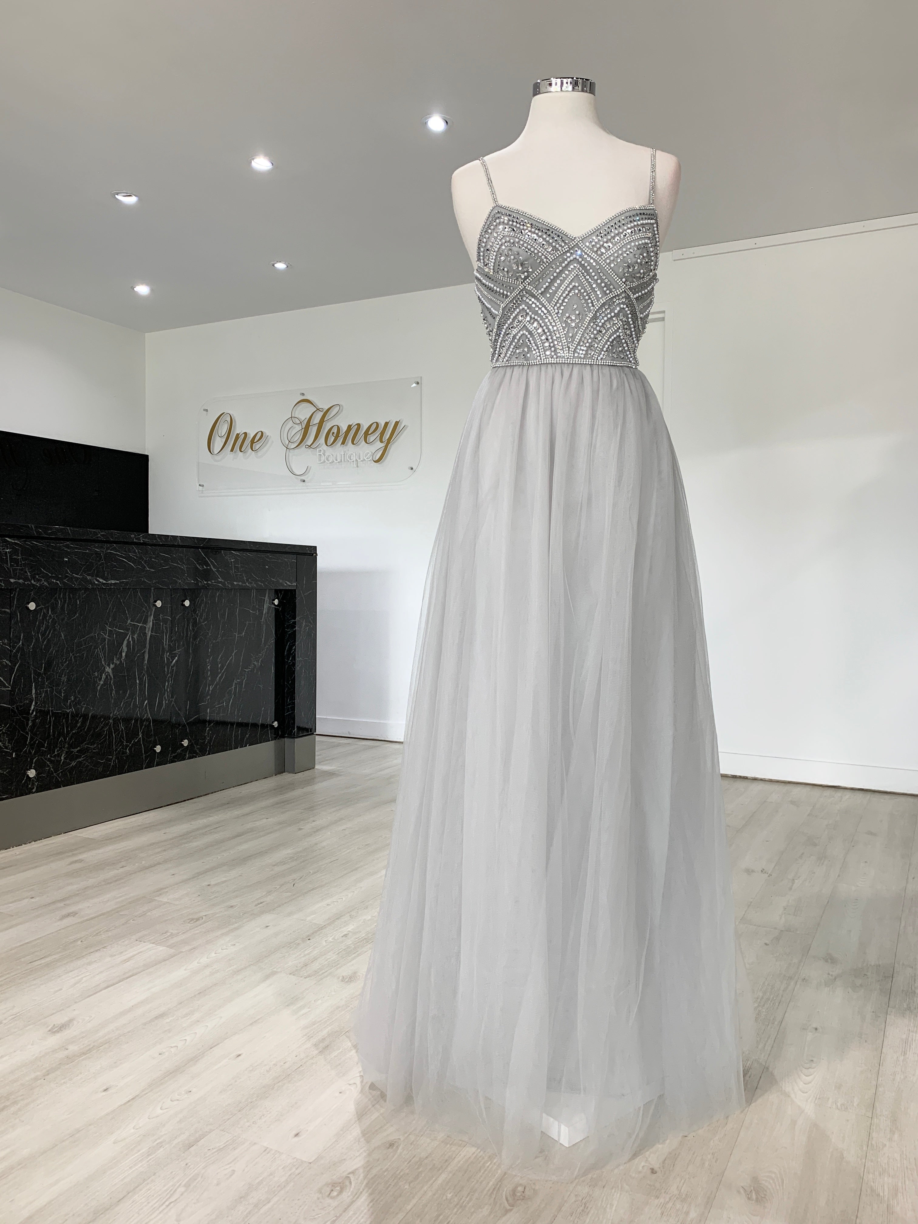 Honey Couture AINSLEY grey silver crystal beaded tulle formal gown on display, Australian designer prom dress, affordable evening gown.