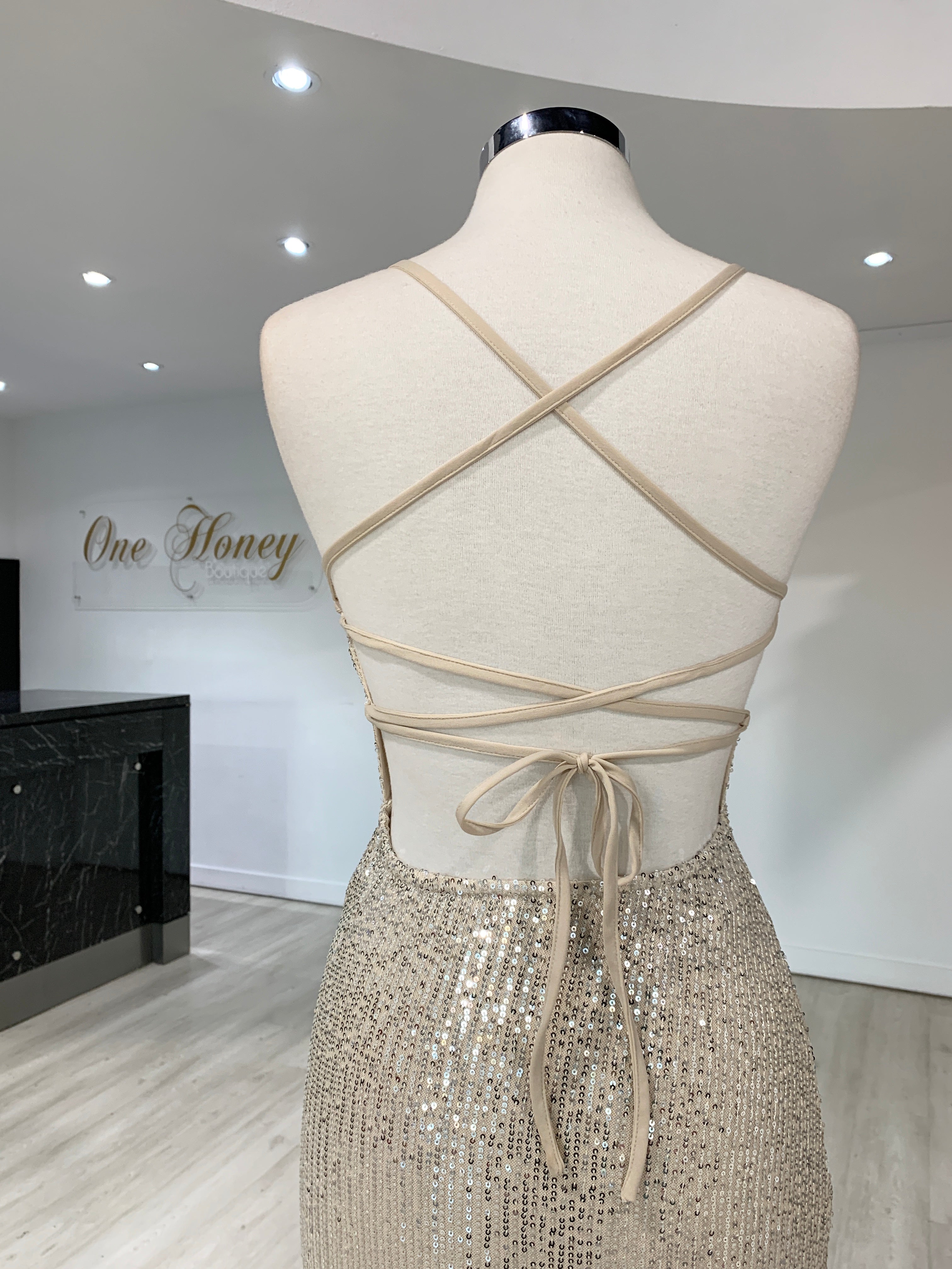 Back view of Honey Couture LUZ Silver Lace Up Sequin Formal Gown, featuring criss-cross straps and intricate lace-up design for Australian Designer look.