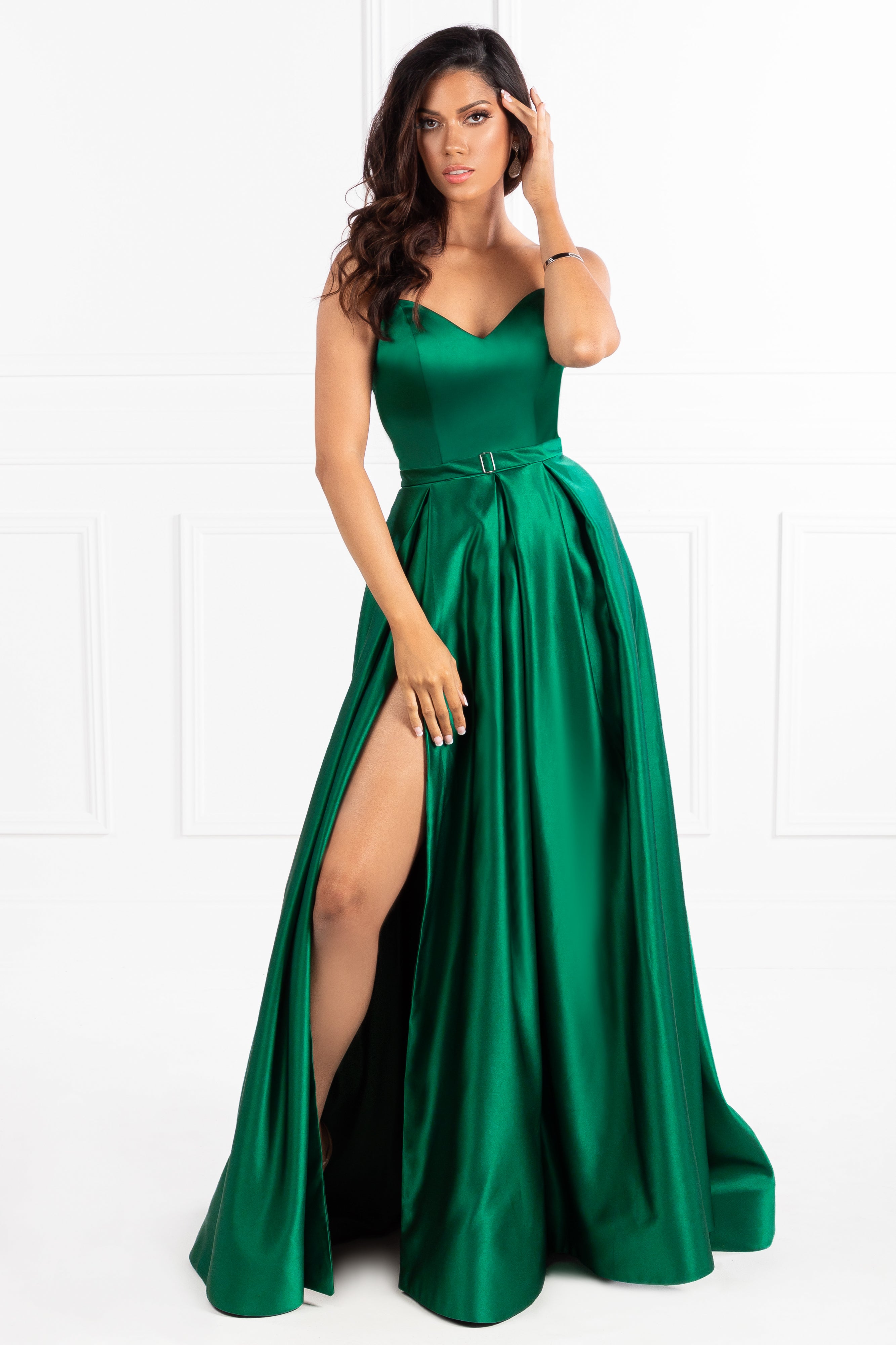 Woman wearing green strapless Honey Couture HELENA A-Line gown with leg split, ideal for prom or evening events, by Australian Designer.